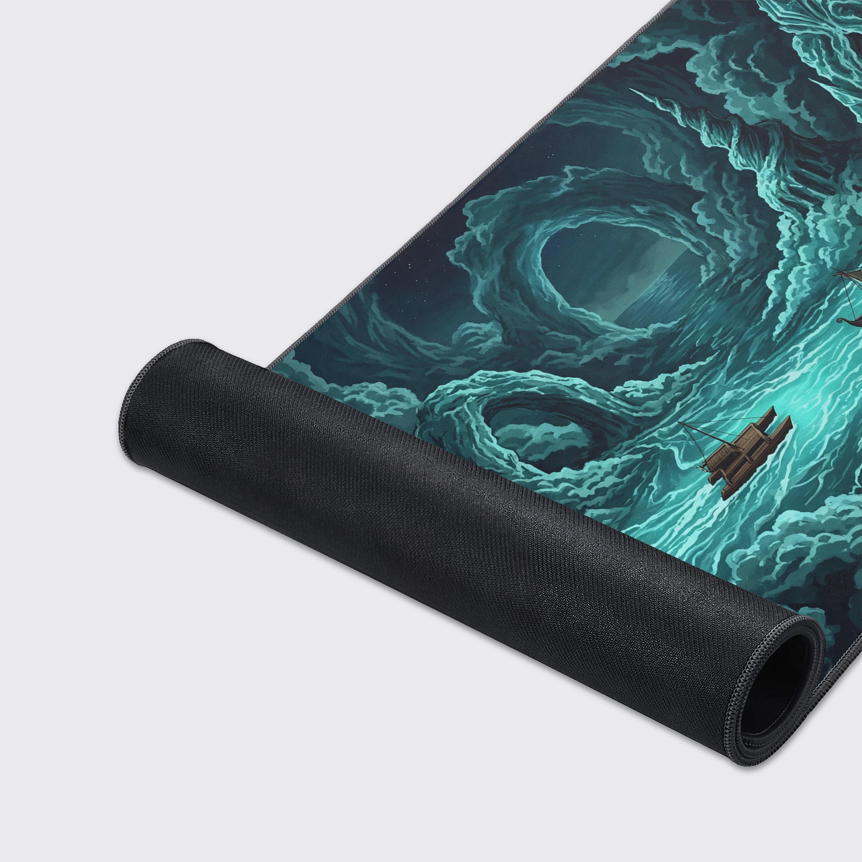Close-up of the Forgotten Realm gaming desk mat showcasing the high-quality stitched edges and smooth fabric texture of the mythical Viking ship design. - Epic Design Pads & Mousepads