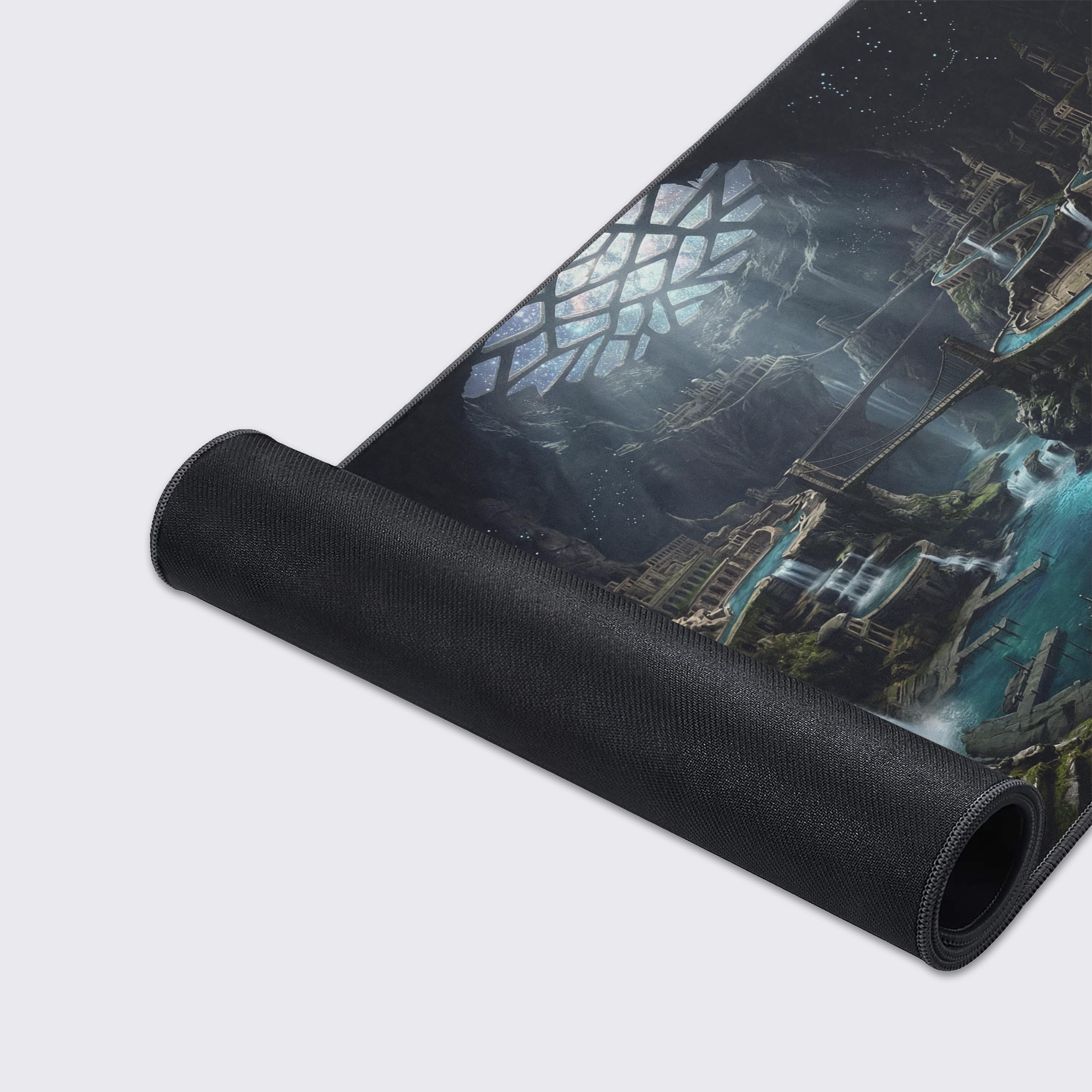 A close-up of the Lost Cavern City gaming desk mat, highlighting the high-quality fabric texture, stitched edges, and the detailed ancient underground city artwork. - Epic Design Pads & Mousepads