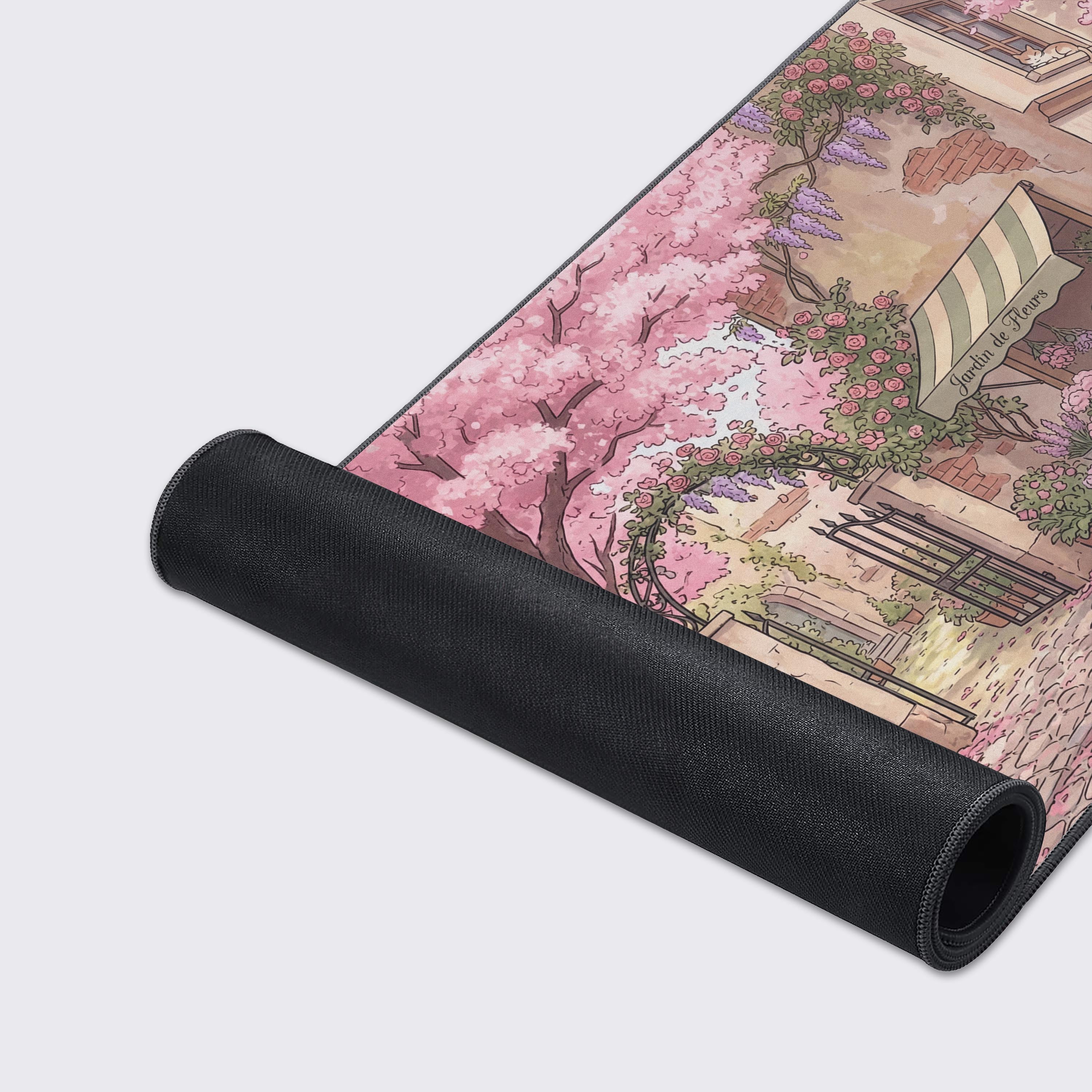 A close-up of the Parisian Spring gaming desk mat, highlighting the detailed illustration of a flower shop and the quality stitched edges of the fabric. - Epic Design Pads & Mousepads