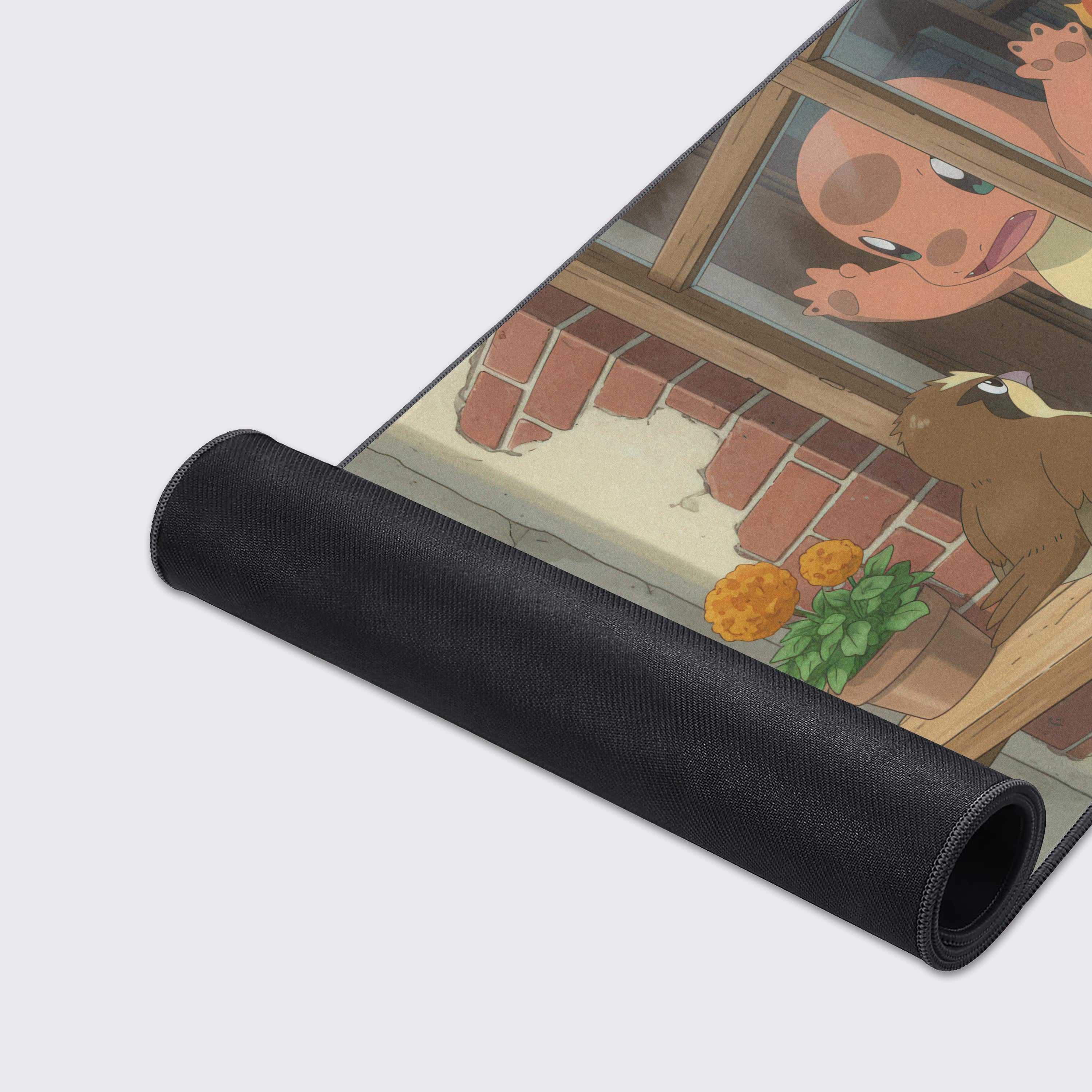 Close-up of the Charmander Pokémon desk mat, highlighting the high-quality stitched edges, non-slip base, and smooth, water-resistant surface. - Epic Design Pads