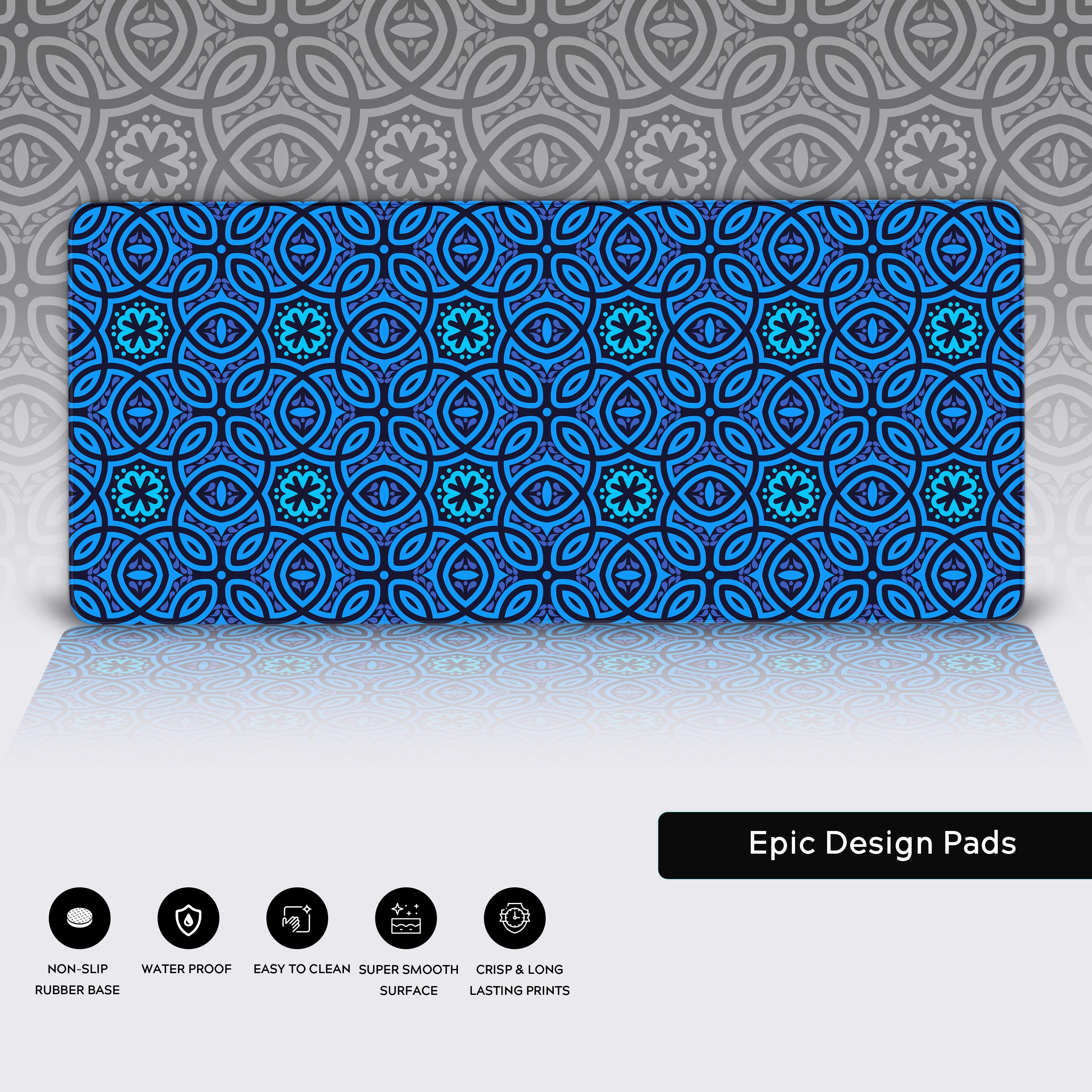 Close-up of the blue Batik pattern desk mat, highlighting the durable stitched edges and non-slip rubber base. - Epic Design Pads & Mousepads