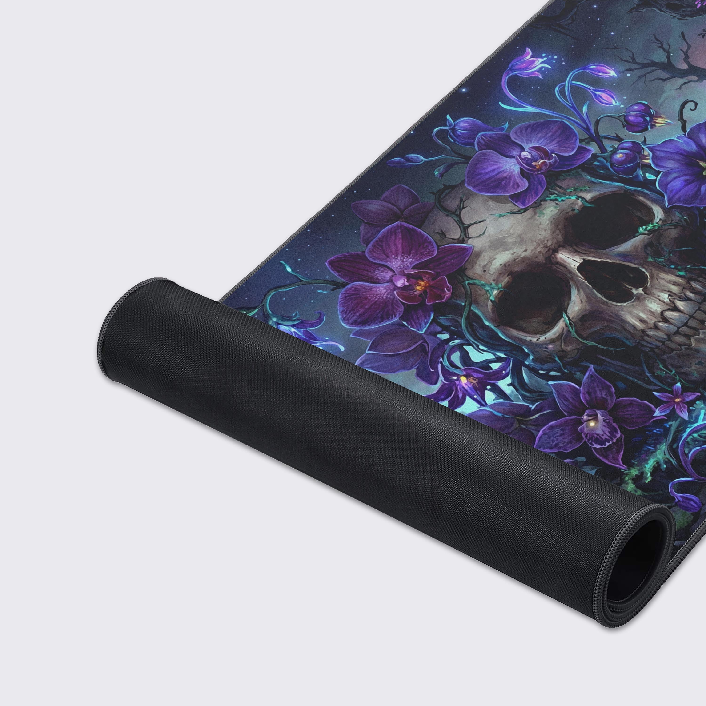Close-up of the Orchid Skull desk mat showcasing the detailed art, durable stitched edges, and non-slip rubber base. - Epic Design Pads & Mousepads