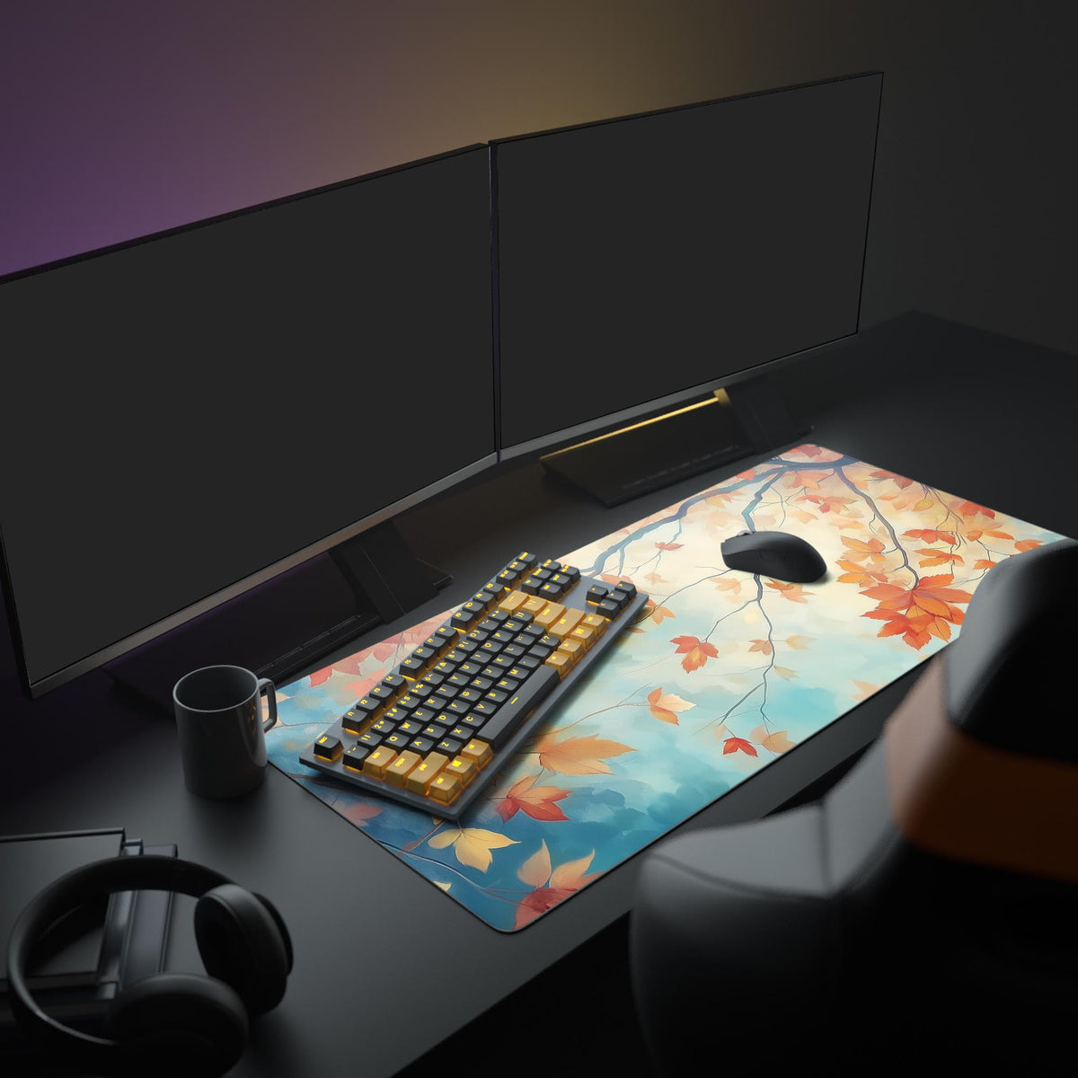 Autumn Leaves Desk Pad in a dark gaming setup with a mechanical keyboard, a mouse and headphones