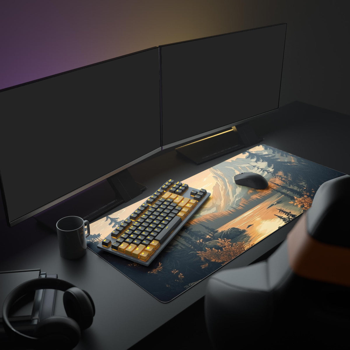 Majestic Mountain Sunset Desk Pad in a dark gaming setup with a mechanical keyboard, a mouse and headphones