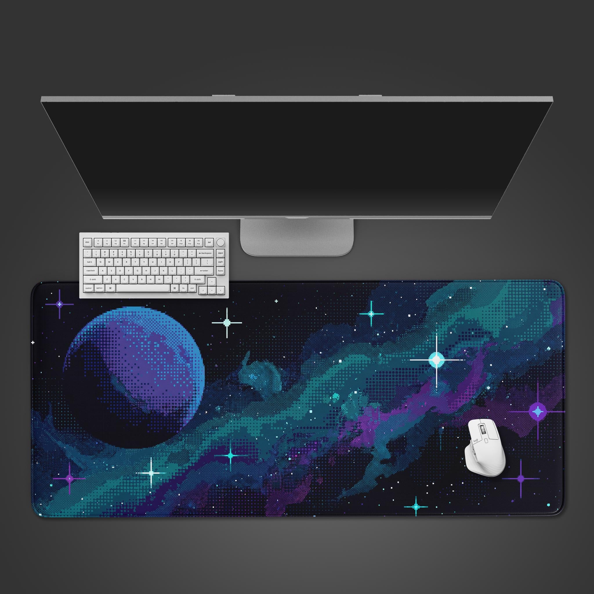 Top-down view of the 8-Bit Cosmos gaming desk mat featuring a pixel art planet and nebula, shown with a white keyboard and mouse on a dark surface. - Epic Design Pads & Mousepads