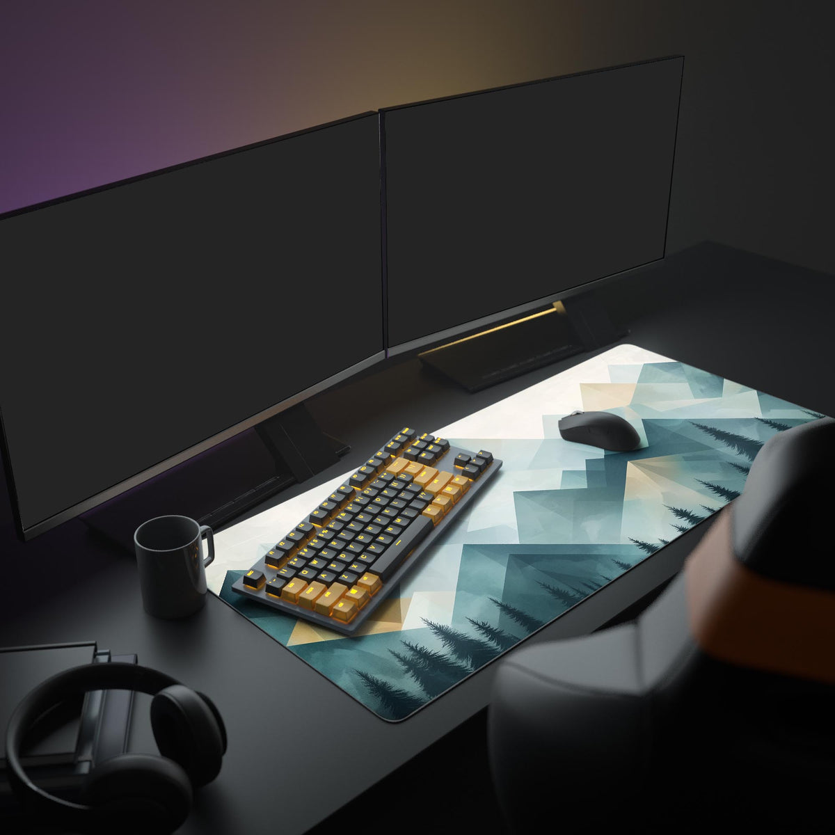 Geometric Mountain Desk Pad in a dark gaming setup with a mechanical keyboard, a mouse and headphones