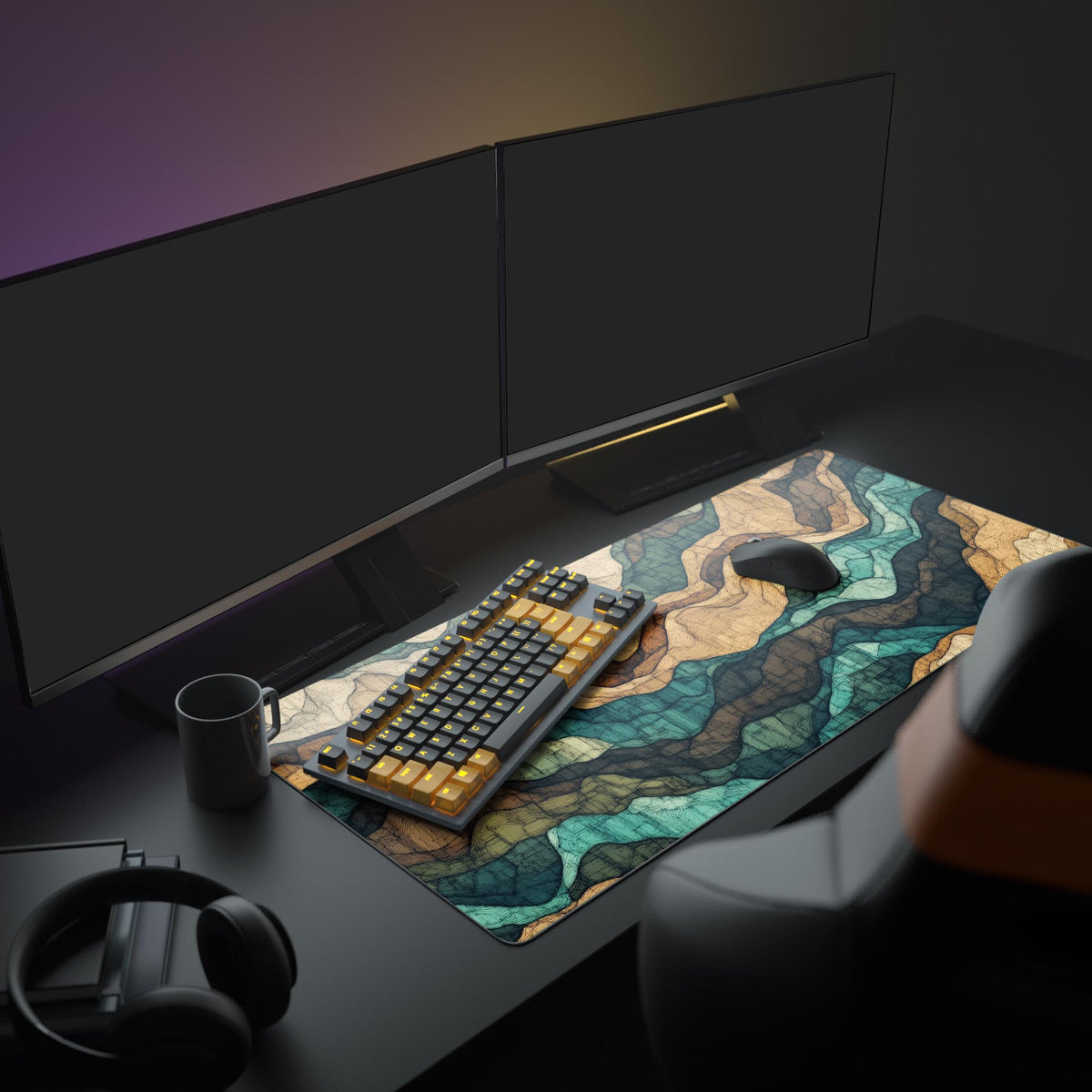 Pixel Topography Mountains Desk Pad in a dark gaming setup with a mechanical keyboard, a mouse and headphones