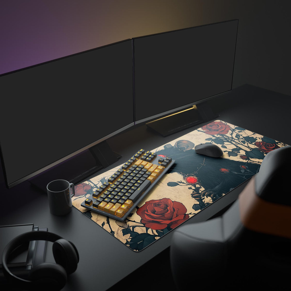 Rat King Desk Pad in a dark gaming setup with a mechanical keyboard, a mouse and headphones