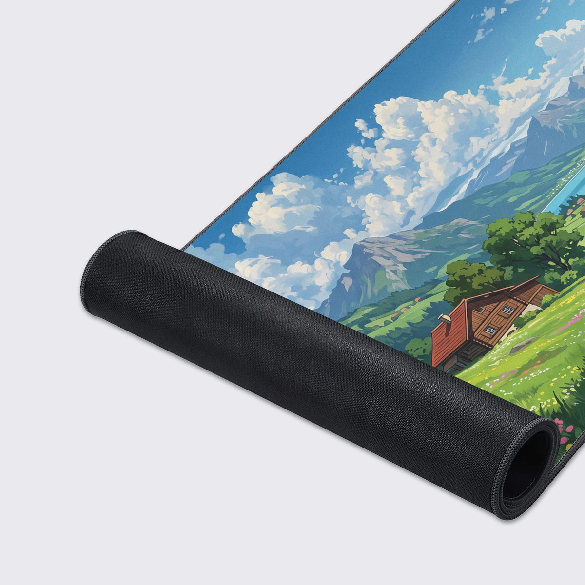 Detail of the scenic desk mat design featuring a crystal-clear blue river flowing past a peaceful mountain village toward majestic distant peaks.