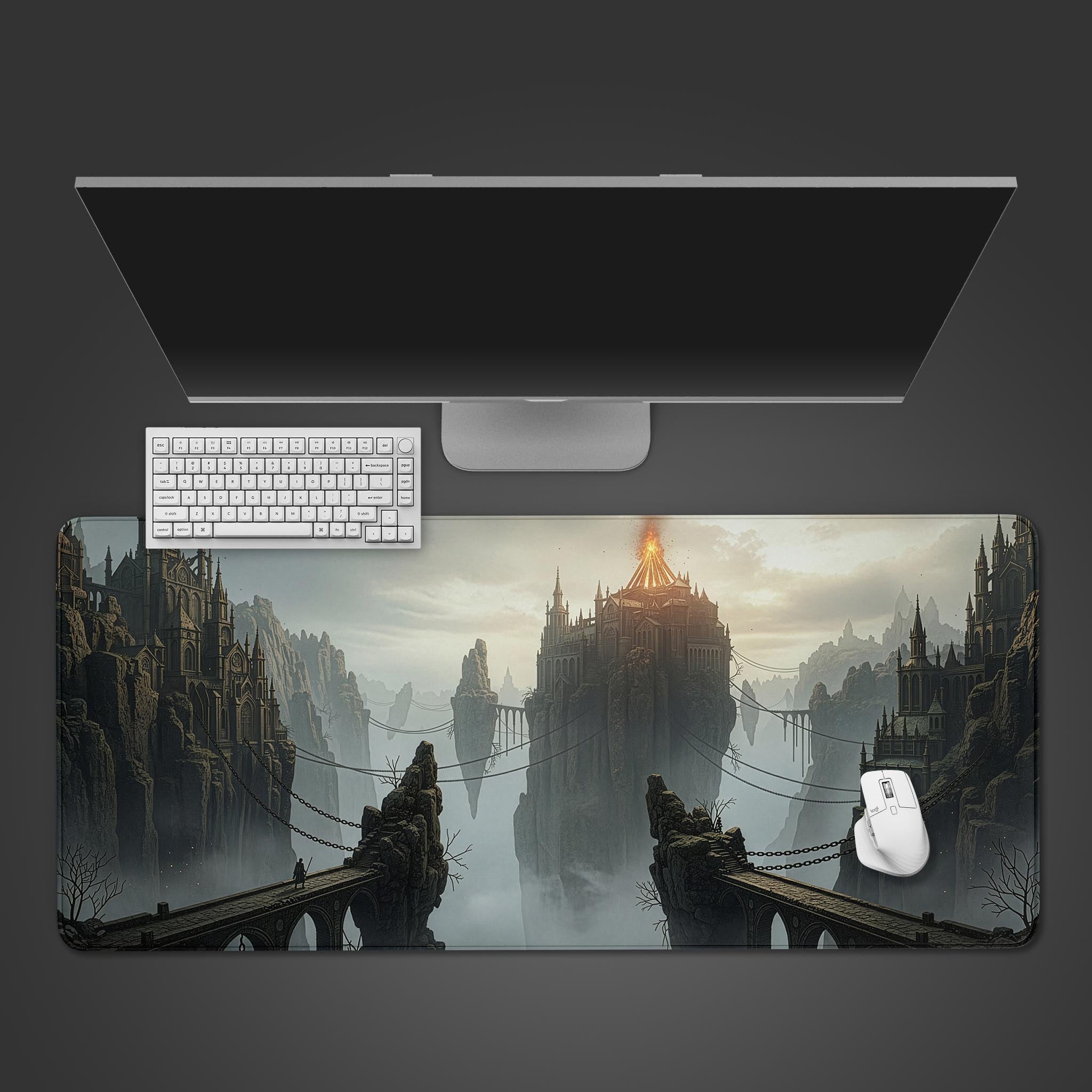 Dark fantasy desk mat with Ashen Bridges floating castle design – top-down desktop view with a black keyboard and gaming mouse. - Epic Design Pads