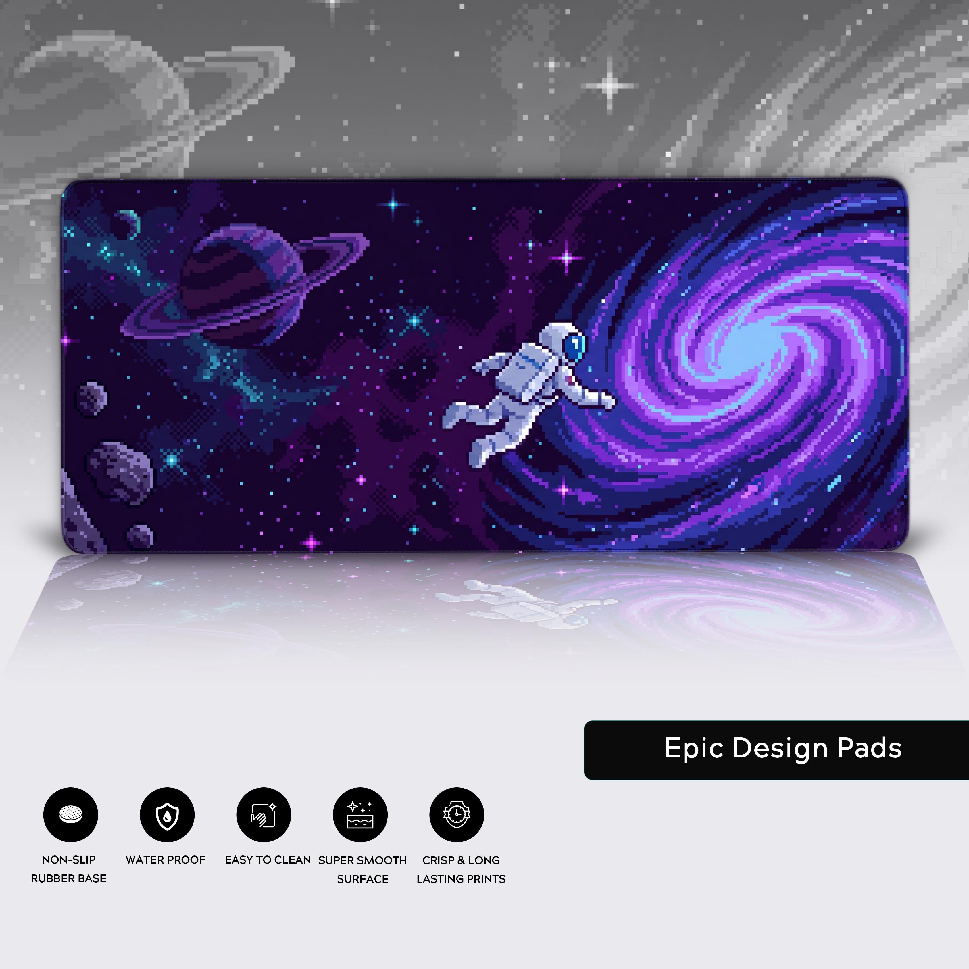Full view of the pixel art space desk mat with feature icons for non-slip and waterproof