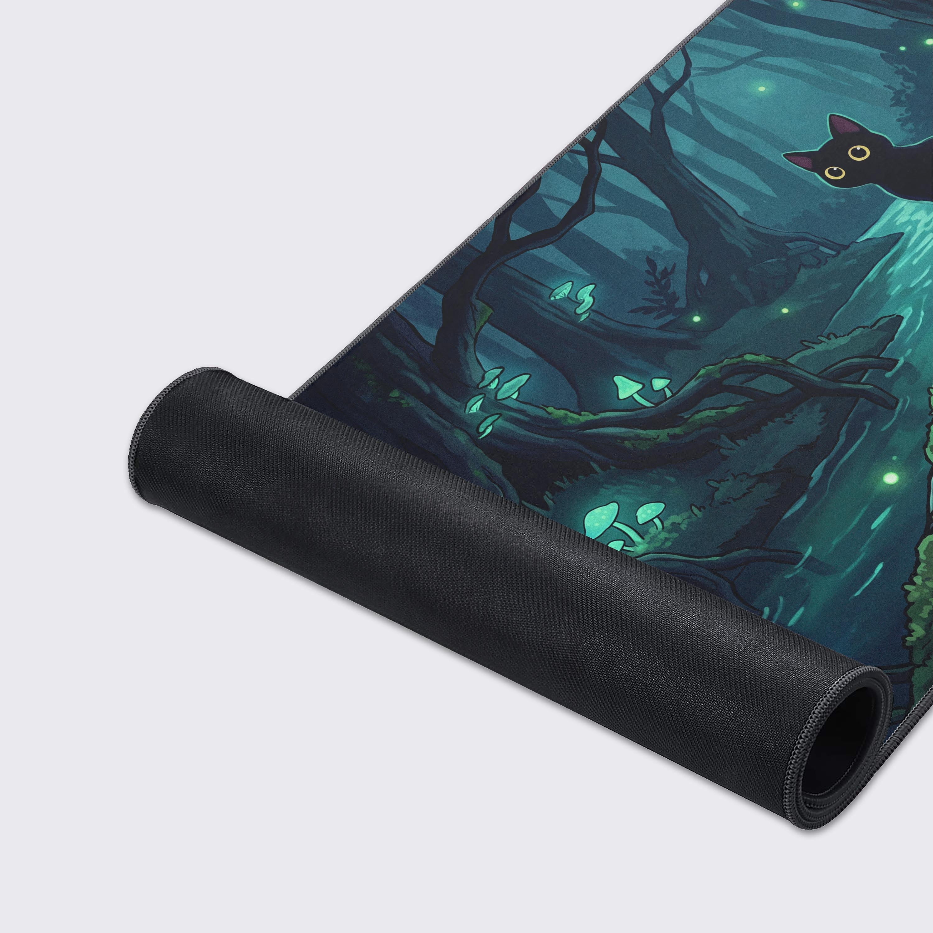 A mystical dark green and teal forest scene on a large desk pad showcasing a magical atmosphere and floating light wisps.