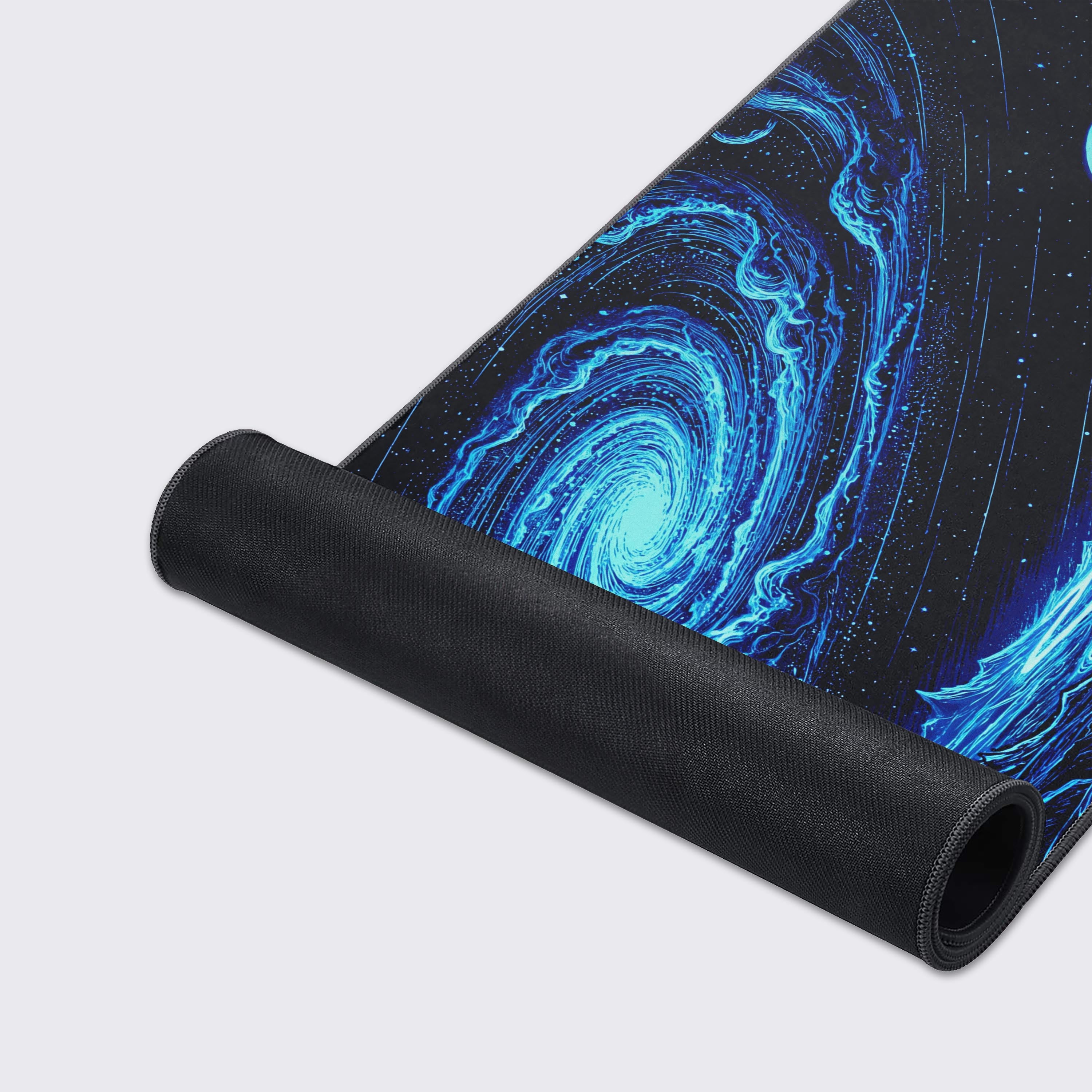 Detail of the ringed planet and glowing blue river on the celestial space-themed gaming mouse pad.