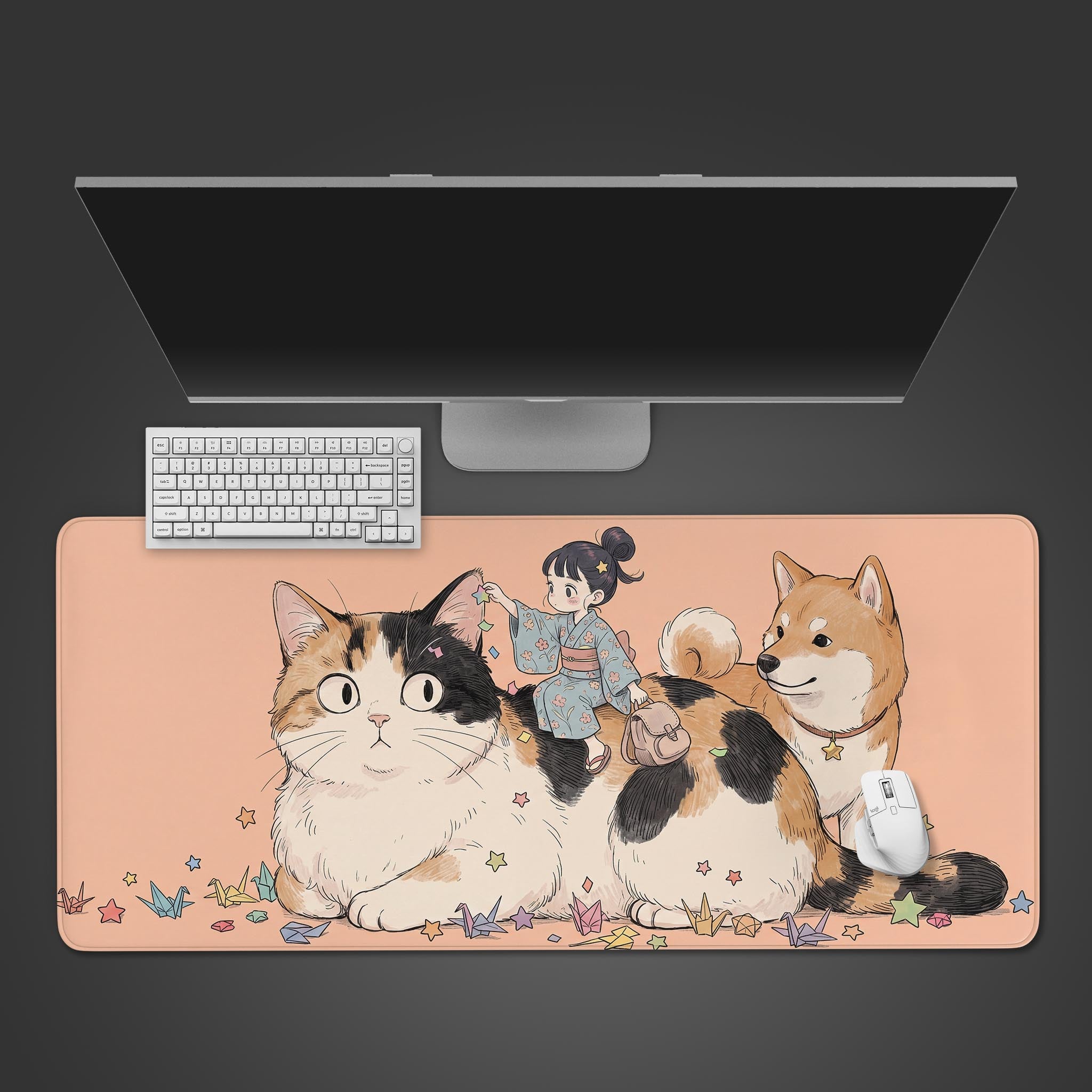 A kawaii XL desk mat featuring a giant calico cat, a little girl in a blue kimono, and a Shiba Inu against a peach background.