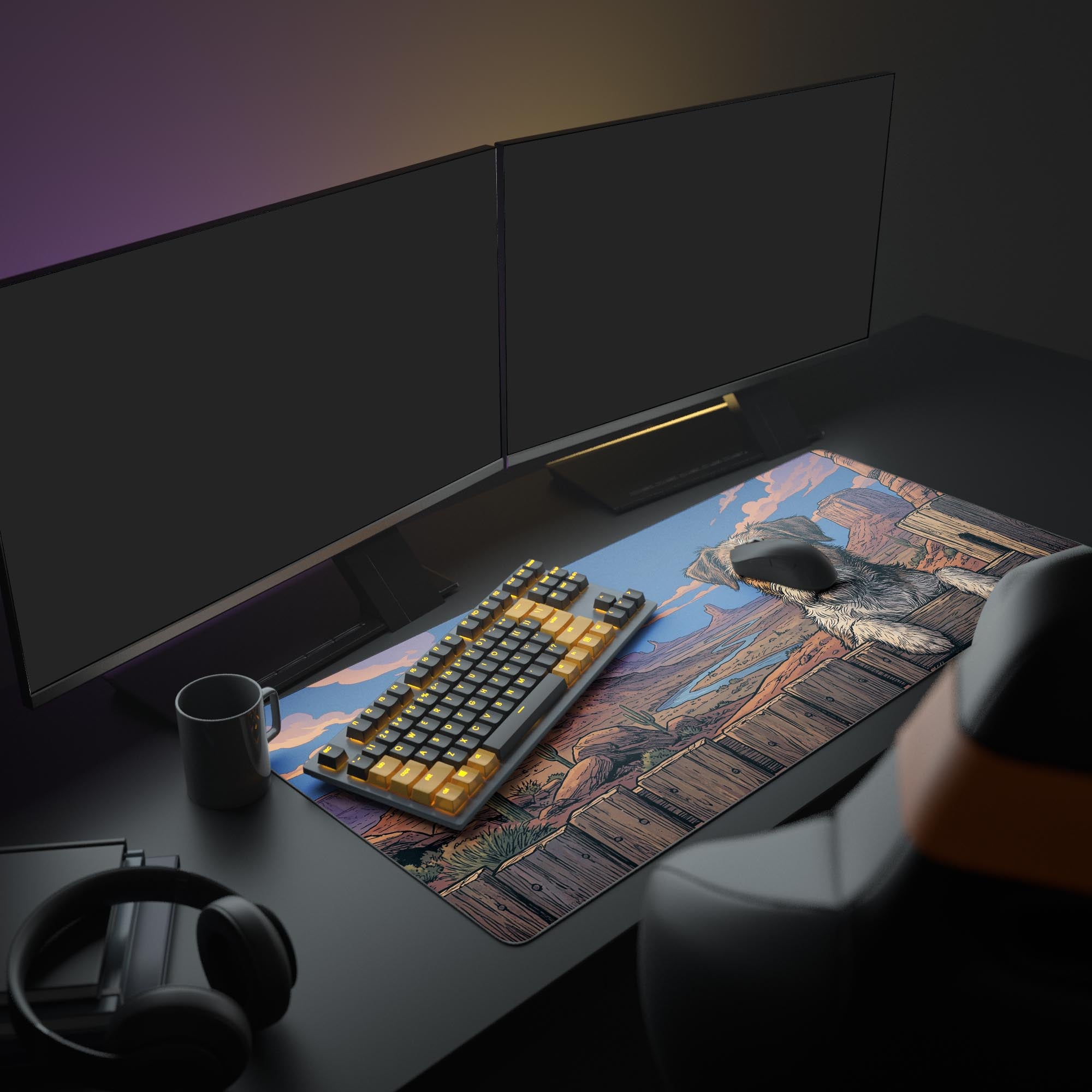 The Canyon Terrier XL mouse pad displayed in a full gaming setup, providing ample space for a keyboard and mouse beneath a large monitor, enhancing the western comic aesthetic. - Epic Design Pads & Mousepads