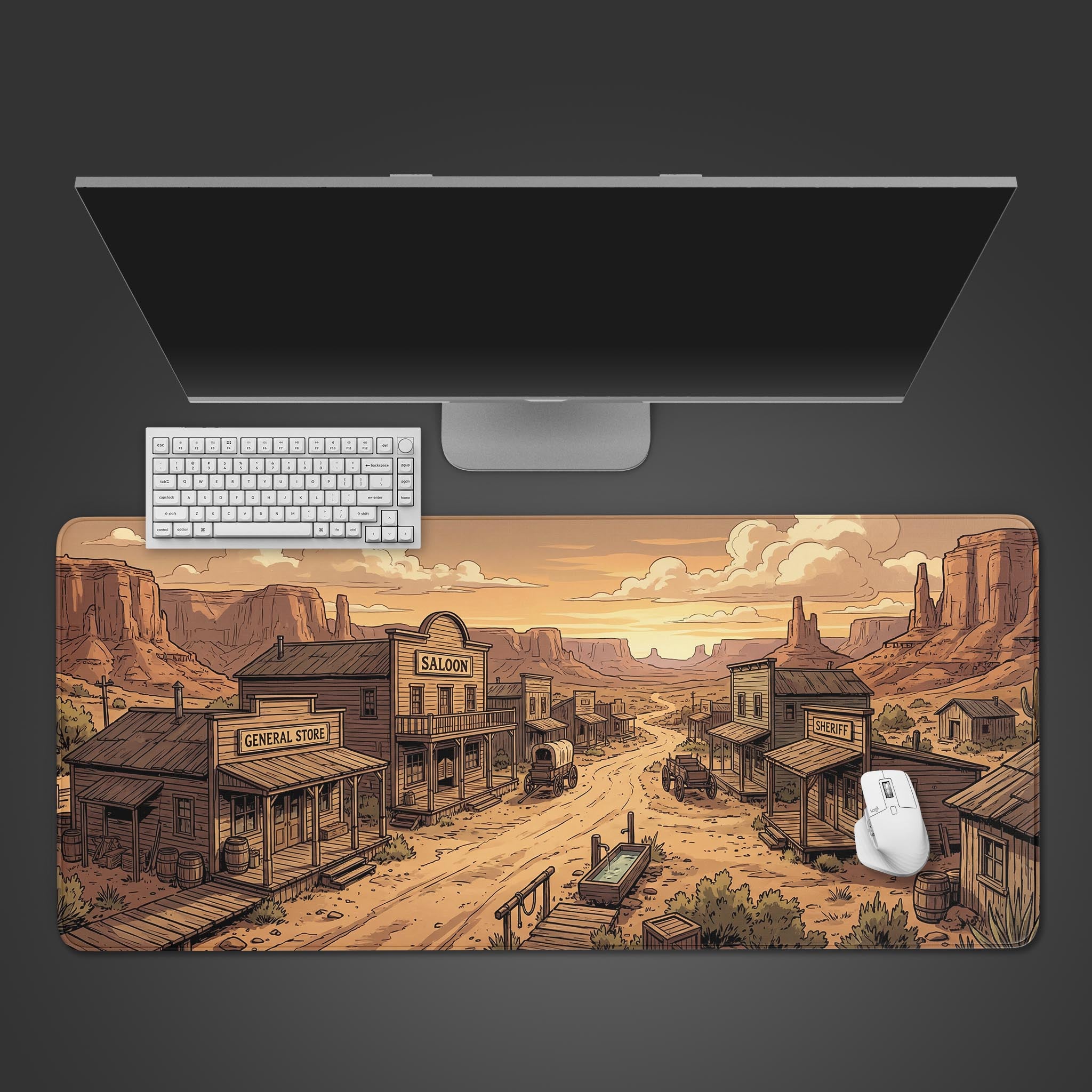 The Canyon Town gaming desk mat viewed from above, showcasing the western town illustration with a keyboard and mouse neatly placed on top. - Epic Design Pads & Mousepads