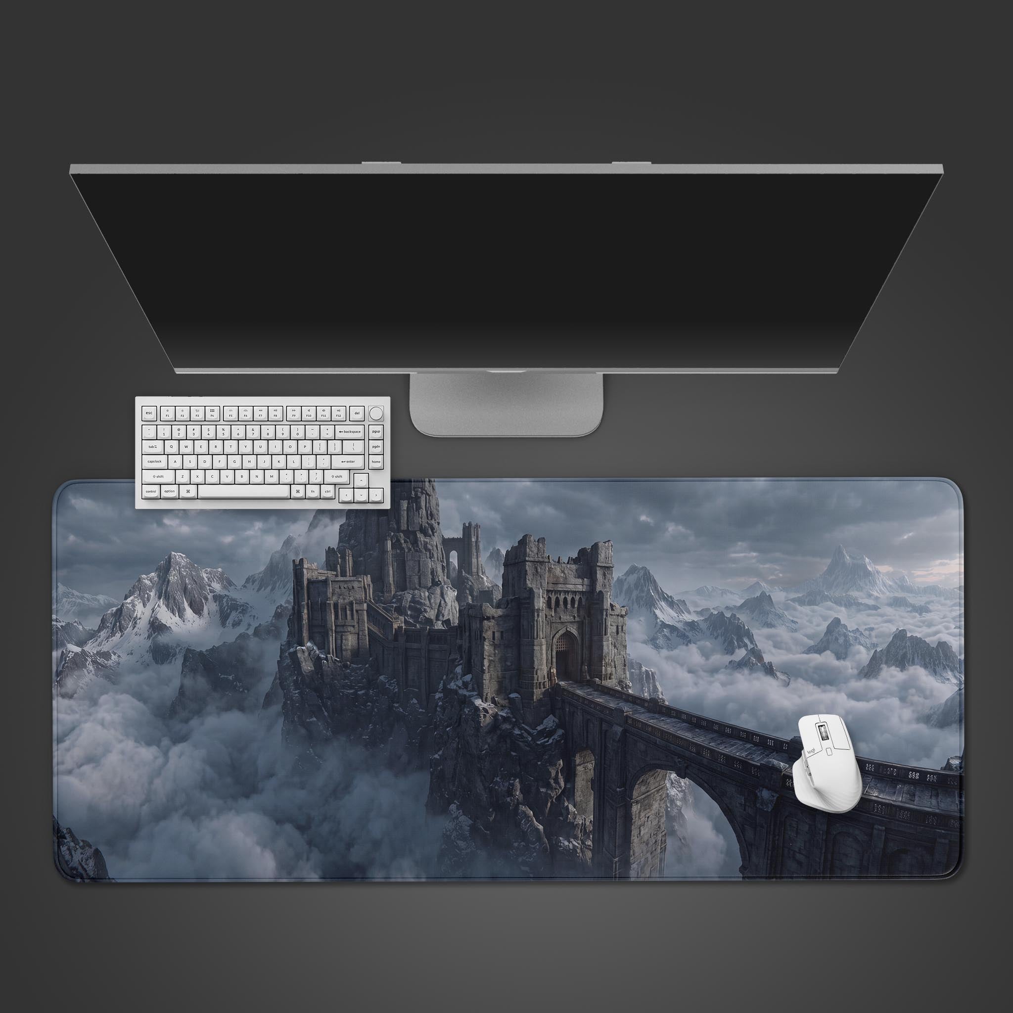 Desk mat displaying a sprawling dark fantasy castle on snowy mountain peaks above the clouds