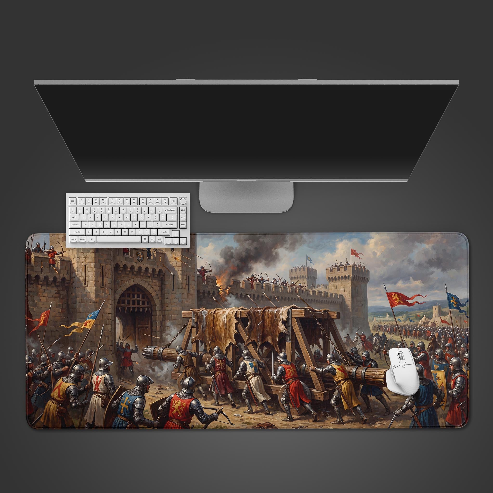 Epic Castle Siege medieval battle desk mat featuring knights and a battering ram
