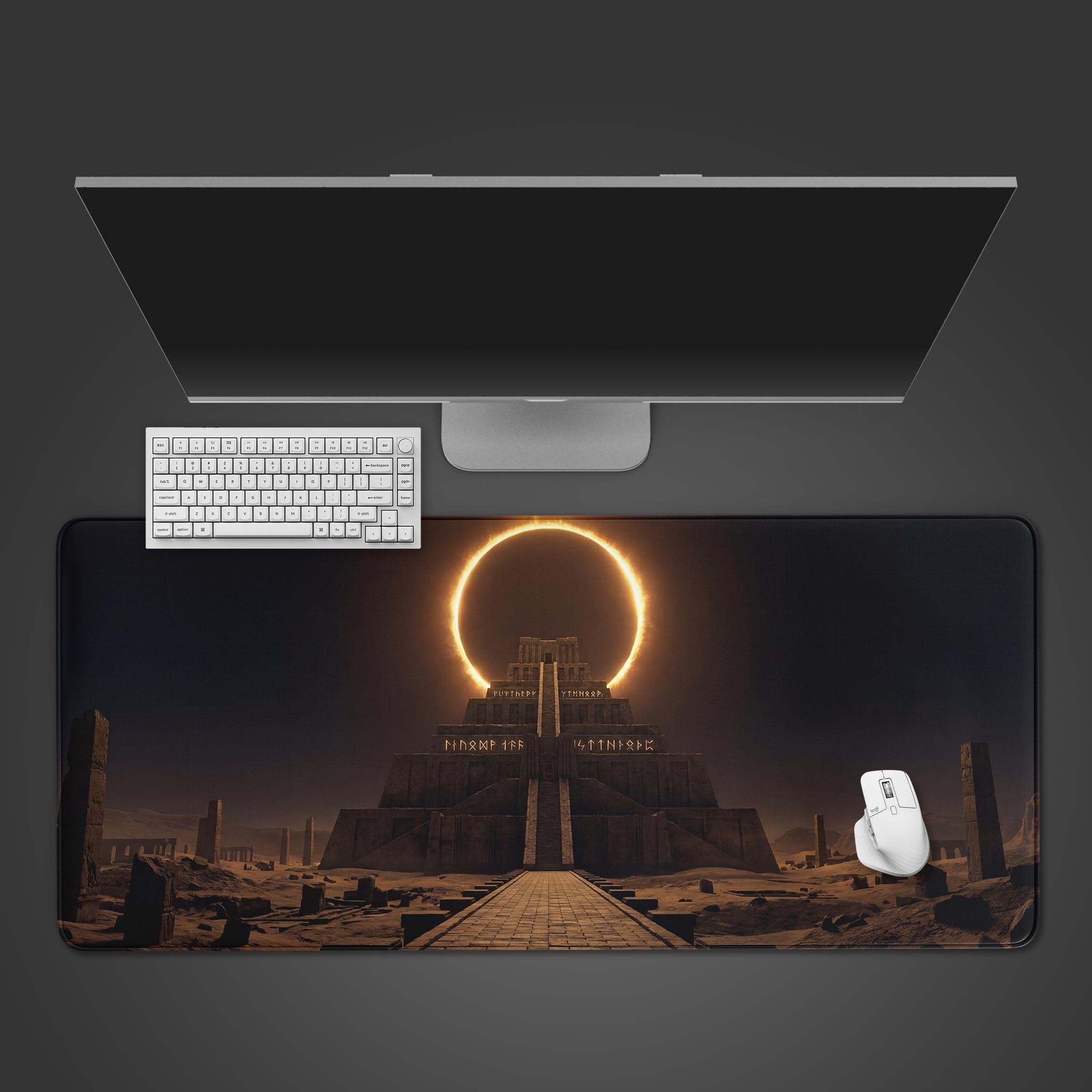 Top-down view of the Celestial Gate Gaming Desk Mat featuring a ziggurat and eclipse design, shown with a white keyboard and mouse on a dark desk. - Epic Design Pads & Mousepads