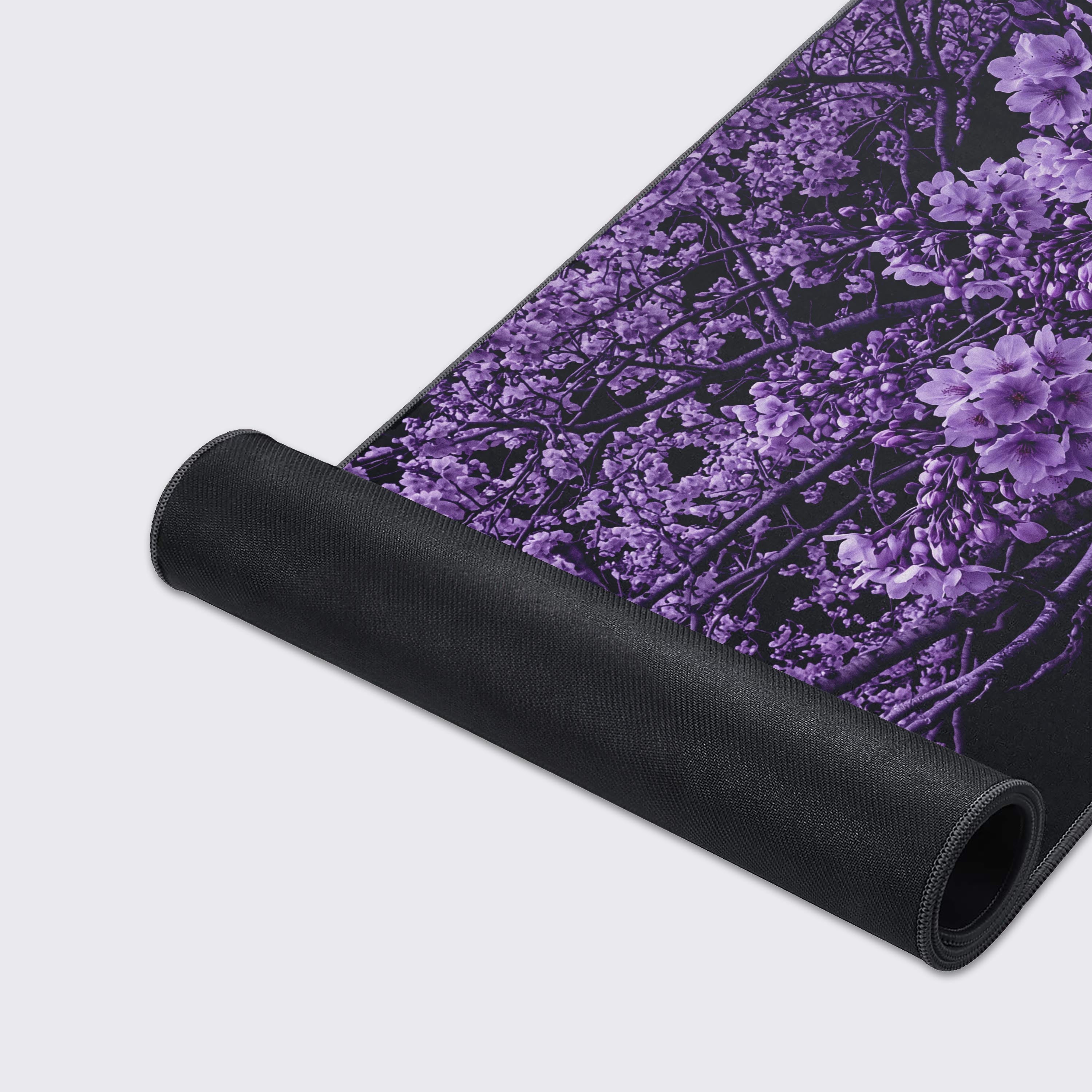 Water resistant and non-slip features of the purple sakura gaming desk mat