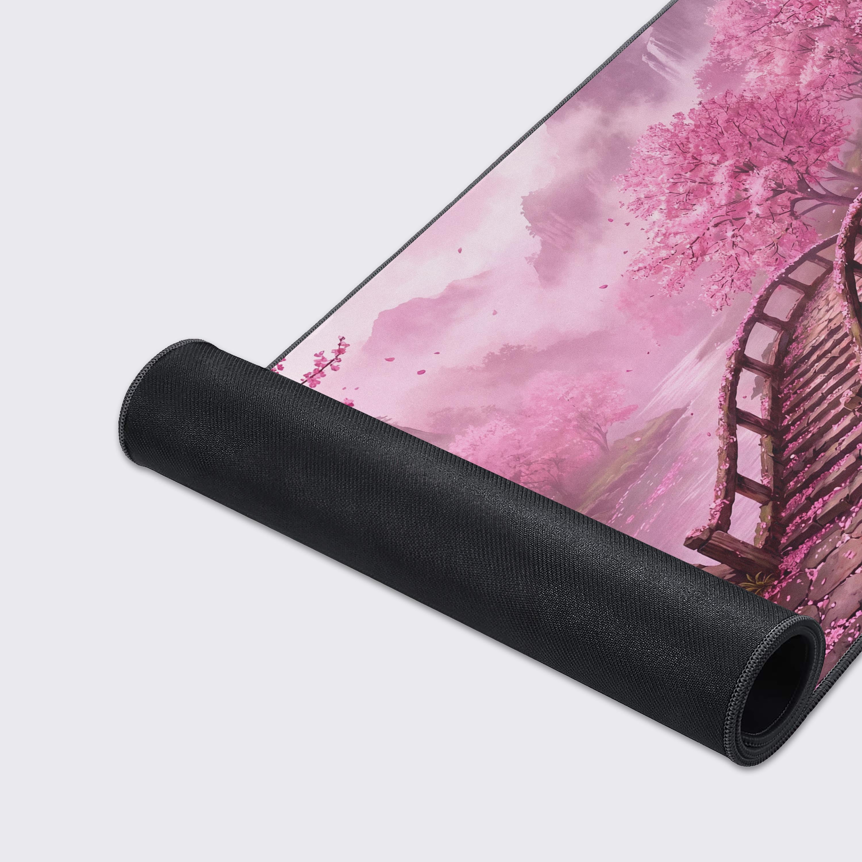 Waterproof and non-slip features shown on the cherry blossom spring landscape desk mat.
