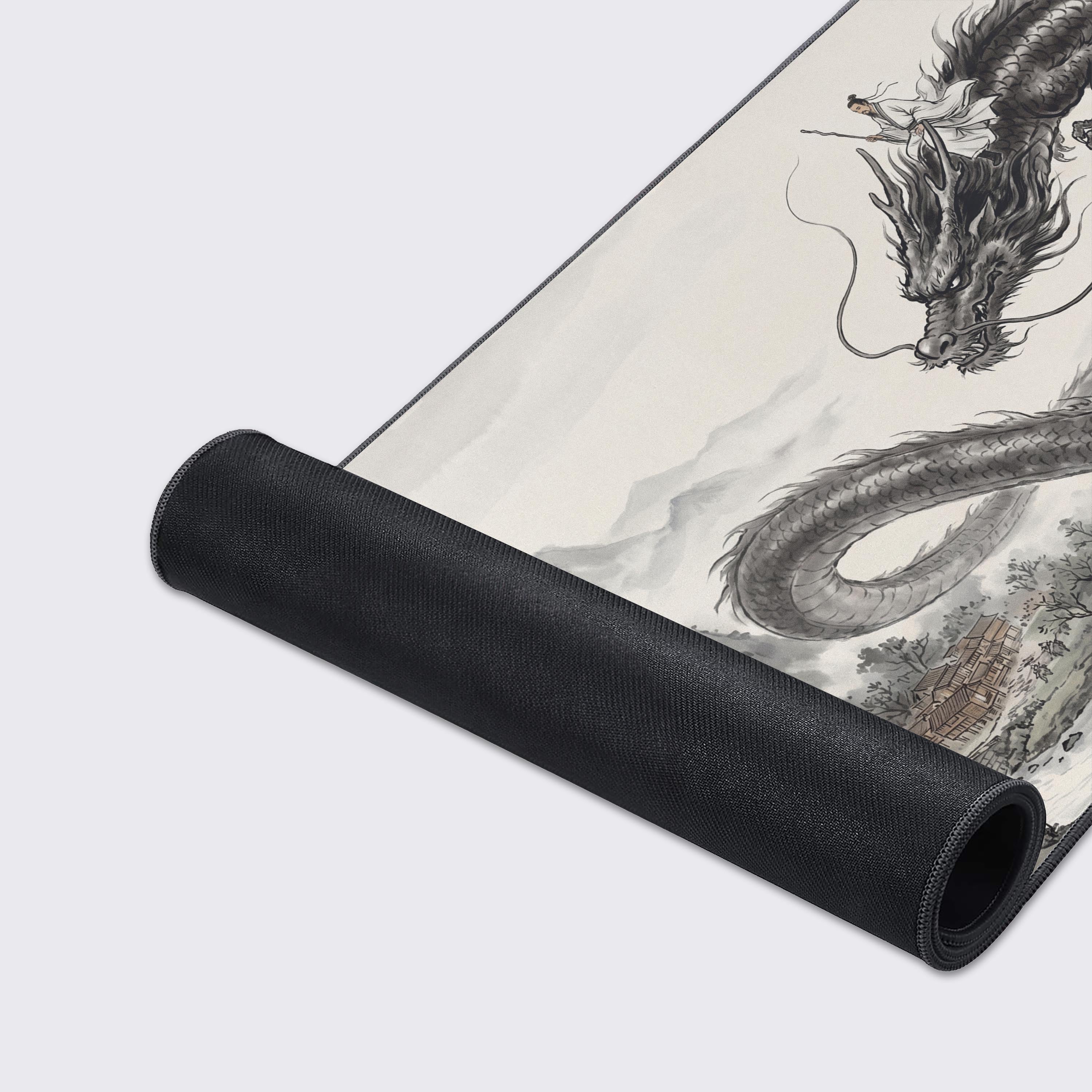 Detailed view of the traditional mountain landscape, ancient village architecture, and calligraphy on the desk mat.