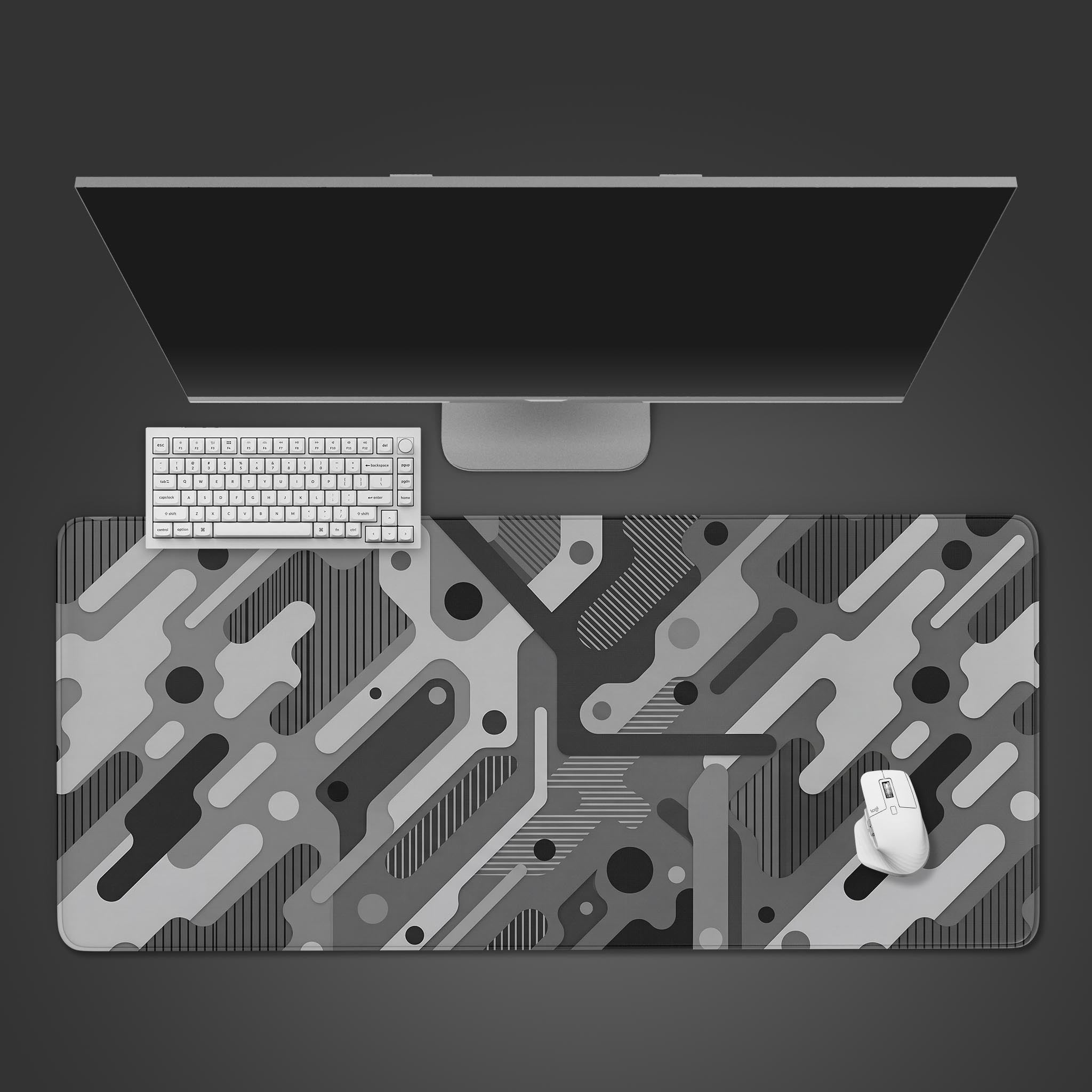 Flat view of the monochrome abstract geometric desk mat showcasing circuit-like interlocking shapes in greyscale.