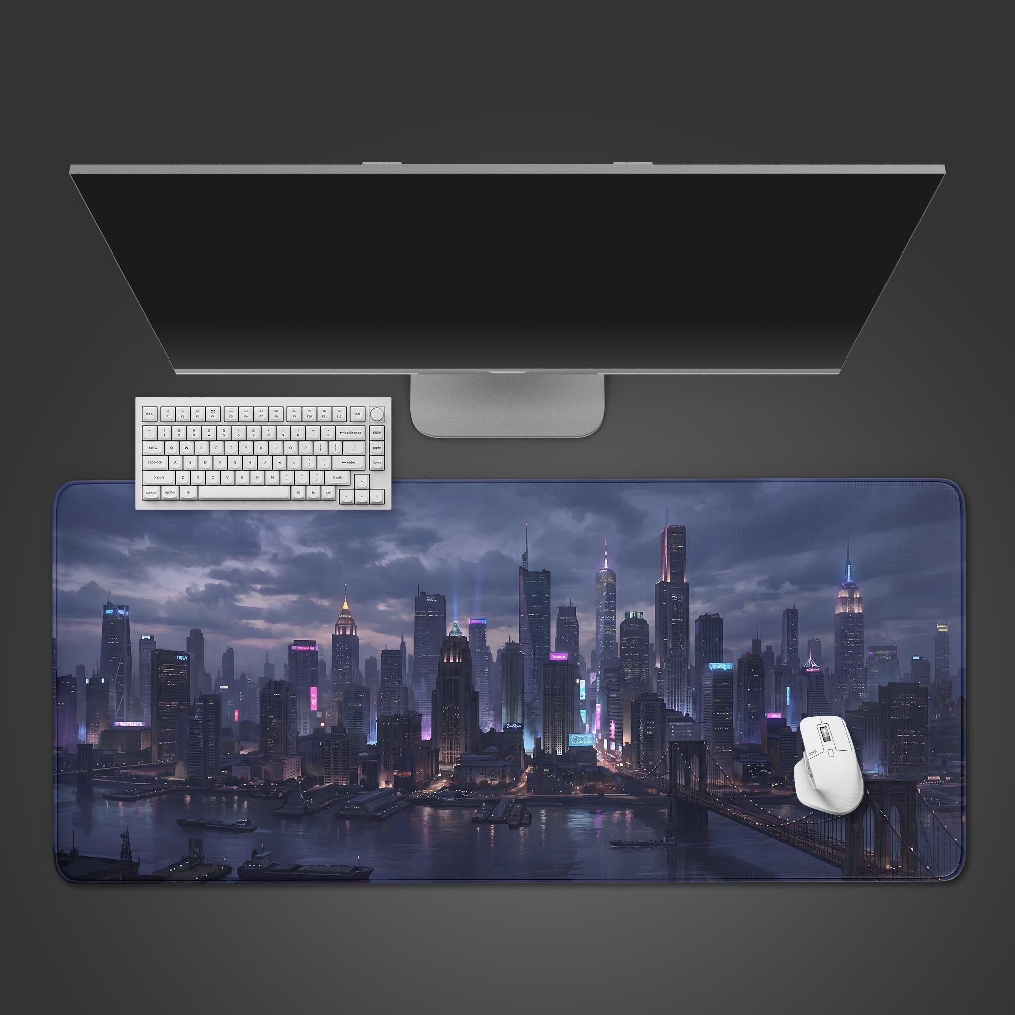 Twilight Metropolis city skyline desk mat featuring glowing skyscrapers and a suspension bridge.