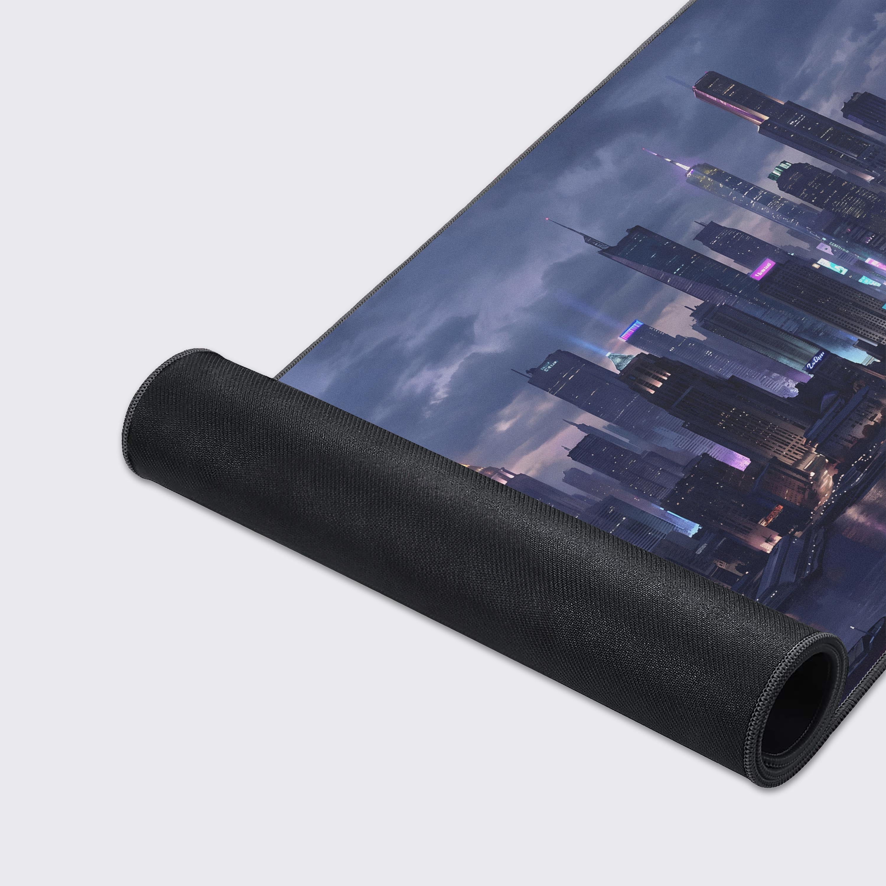 Large desk mat with a futuristic night city aesthetic rolled out on a gamer desk.