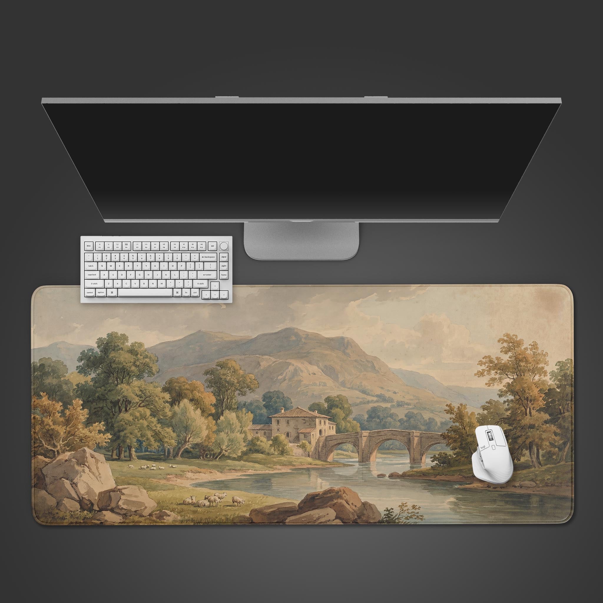 A top-down view of the Classical Pastoral gaming desk mat, featuring a vintage landscape painting, with a white keyboard and mouse on it. - Epic Design Pads & Mousepads
