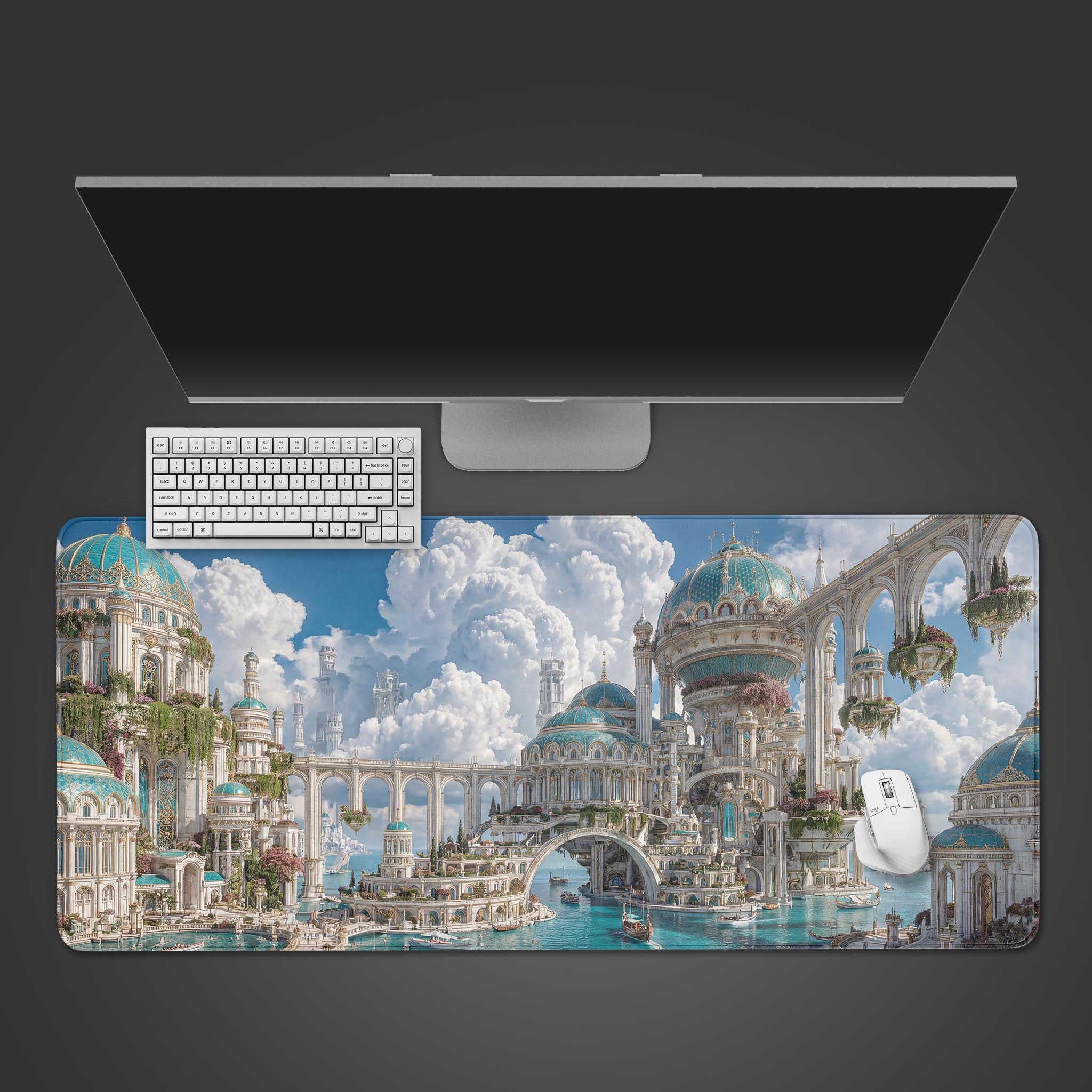 Top-down view of the Cloudborne Empire gaming desk mat, showcasing its ethereal fantasy city design alongside a sleek monitor, keyboard, and mouse. - Epic Design Pads & Mousepads