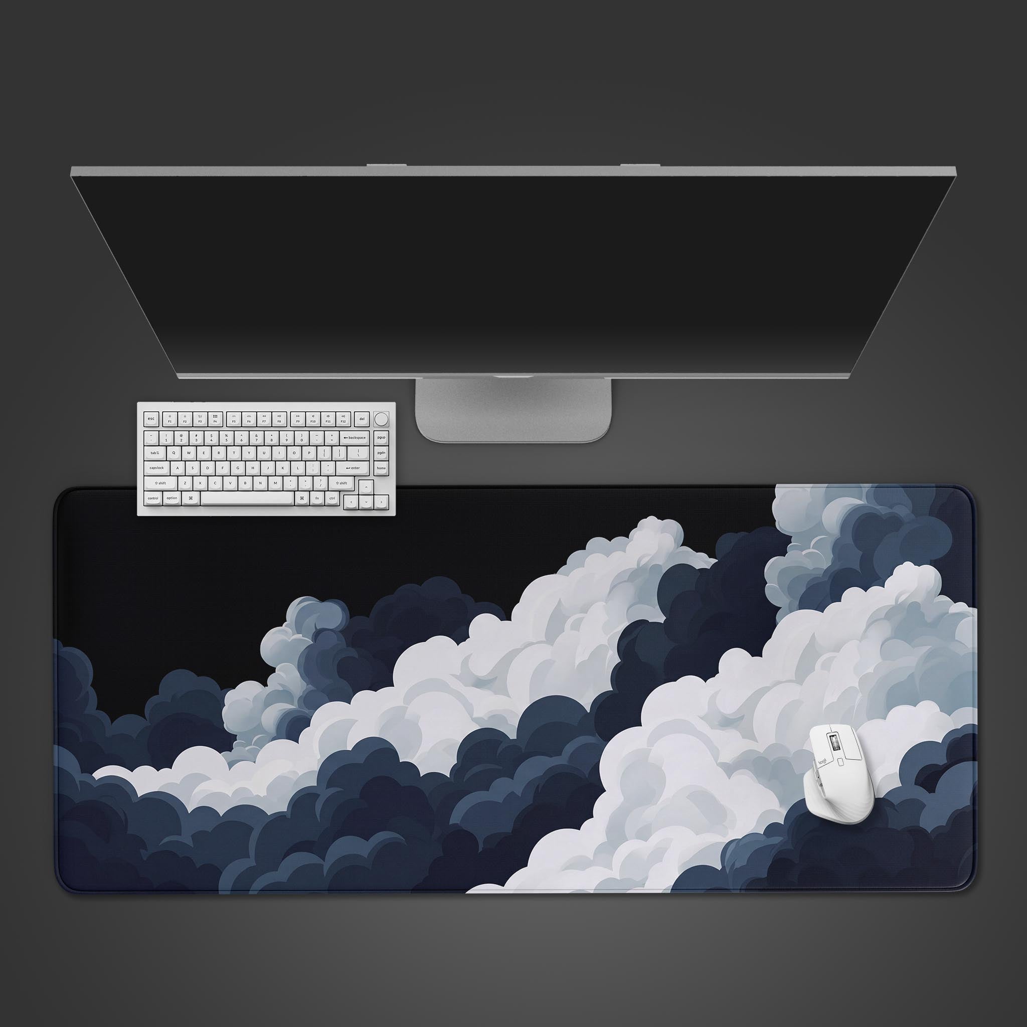 Obsidian Clouds desk mat featuring moody stylized dark and white cloud formations