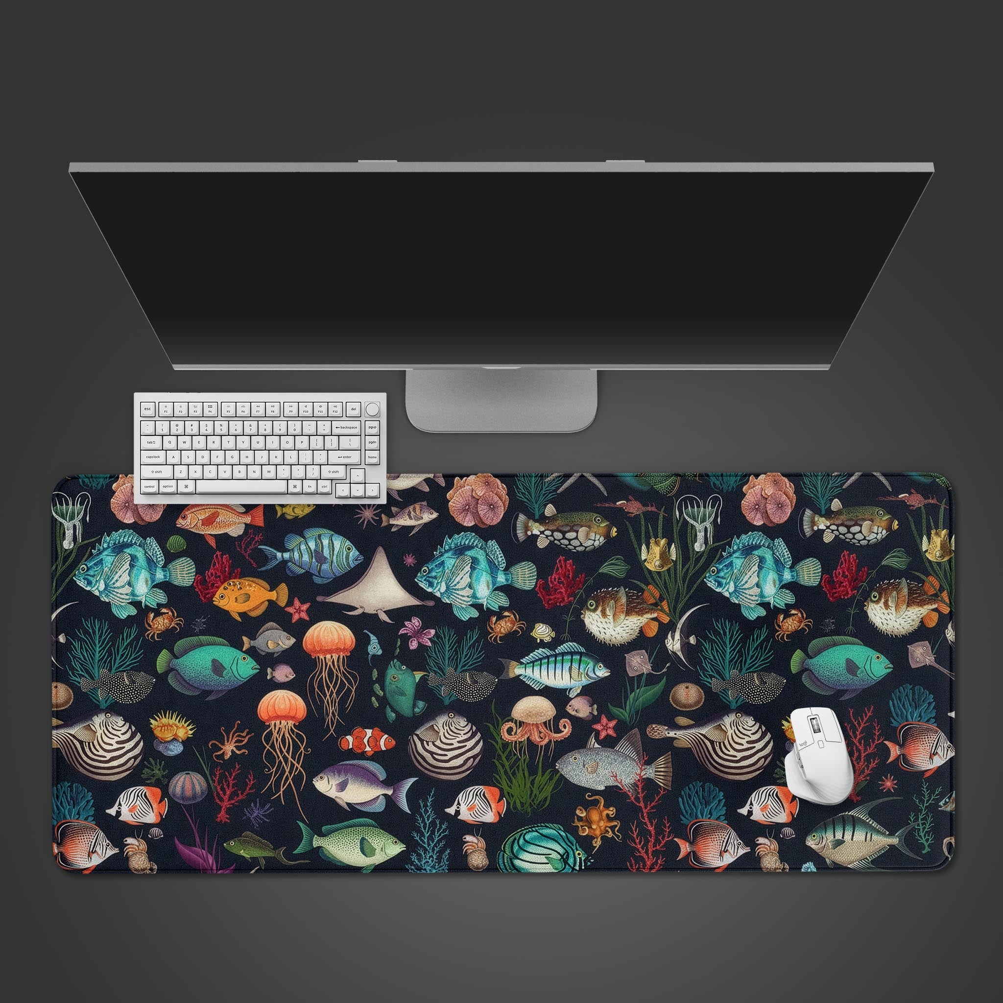 Coral Realm desk mat with vibrant ocean pattern, shown on a desk with a white keyboard and mouse. - Epic Design Pads