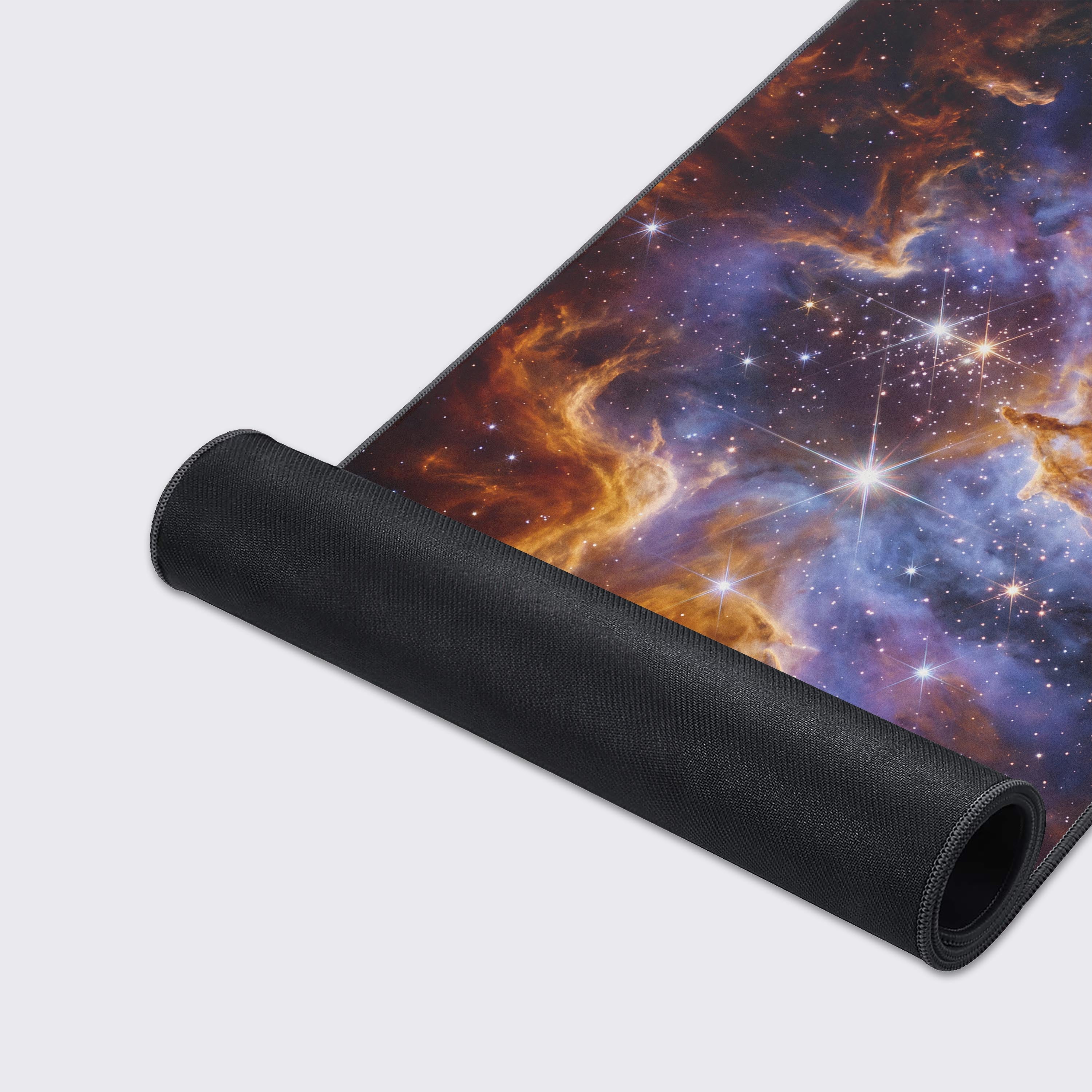 Aesthetic gaming setup featuring a waterproof space-themed desk mat with non-slip base