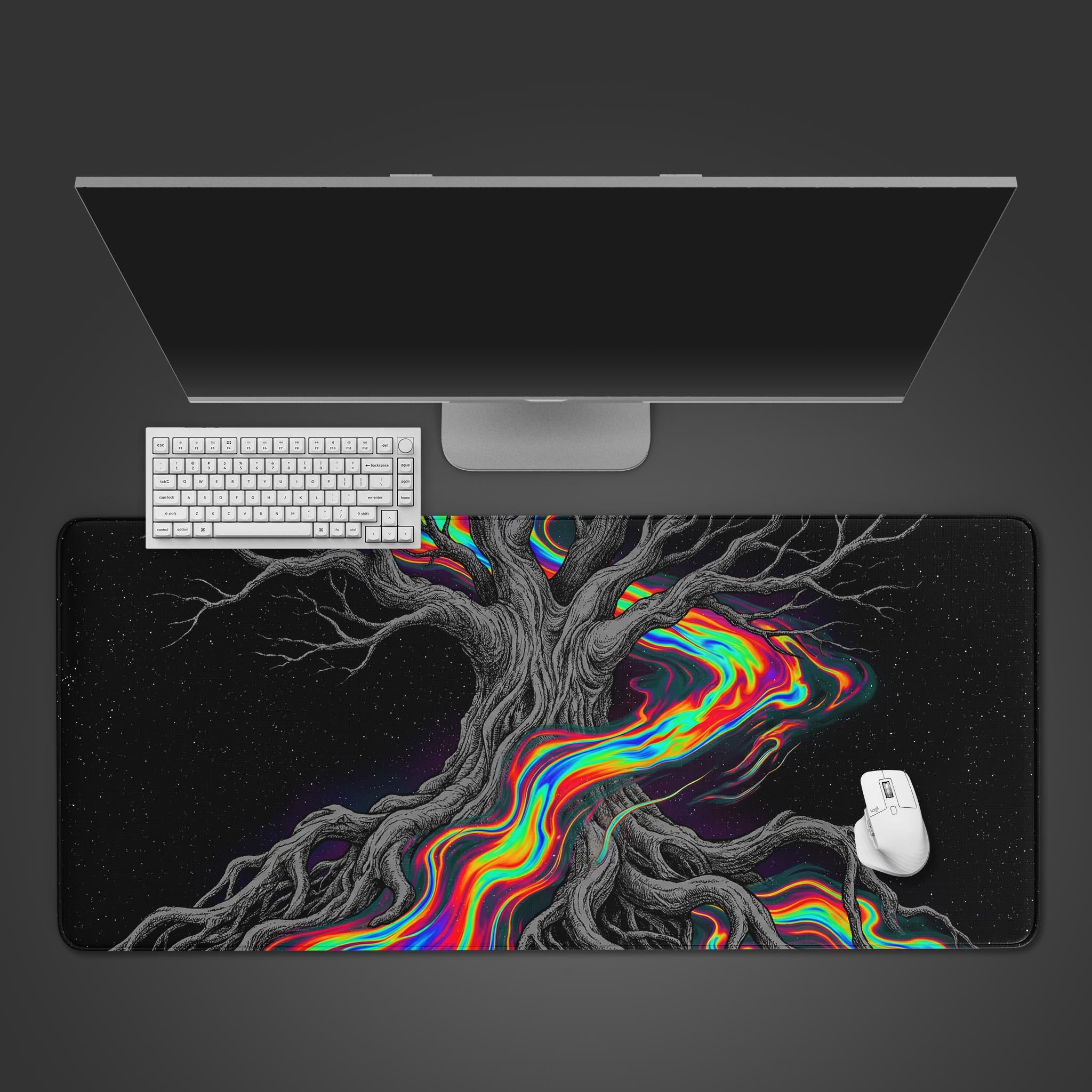 Top-down view of the Cosmic Roots gaming desk mat featuring a psychedelic tree design, shown with a white keyboard and mouse on a dark background. - Epic Design Pads & Mousepads