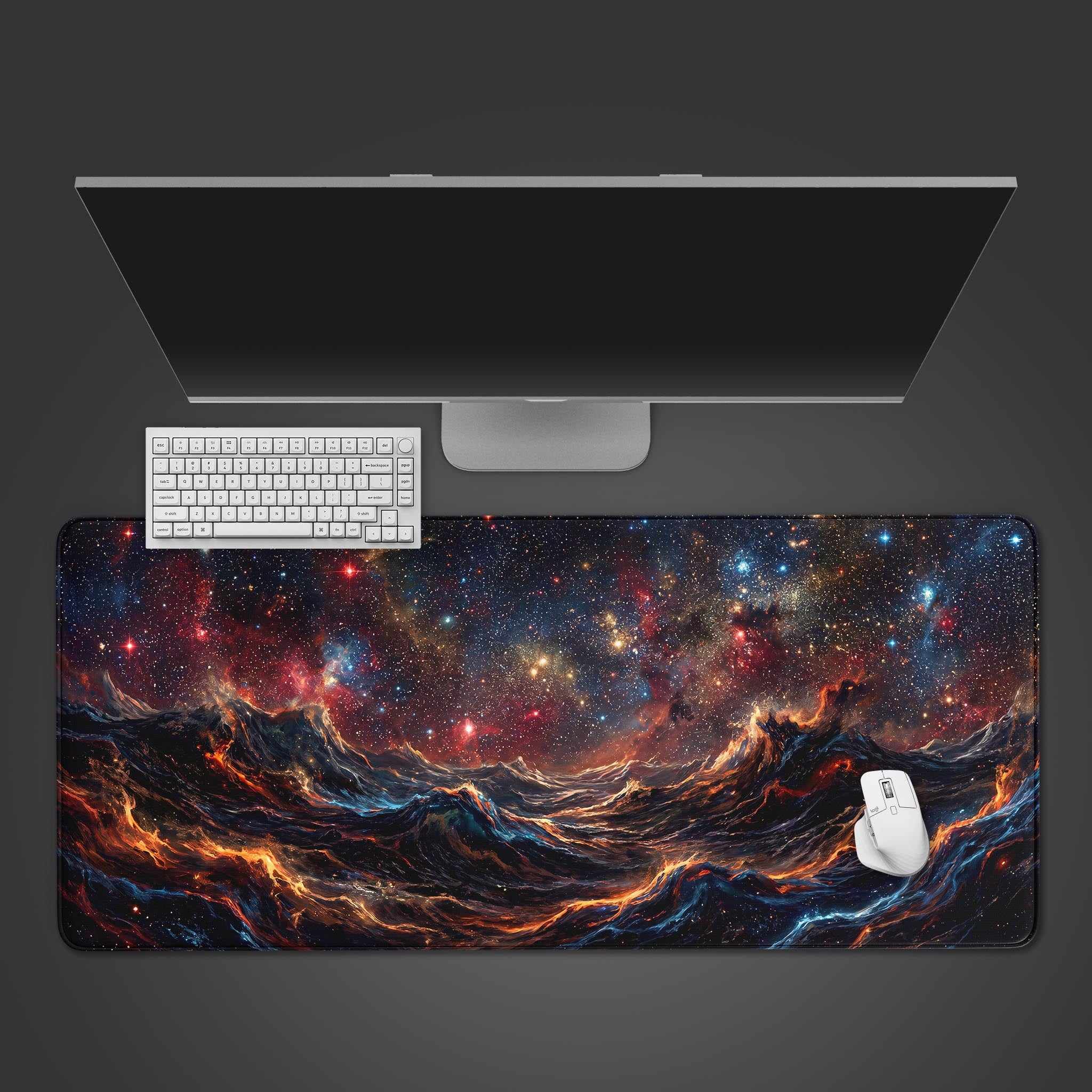 Cosmic Tides desk mat featuring fiery orange and deep blue space nebula waves