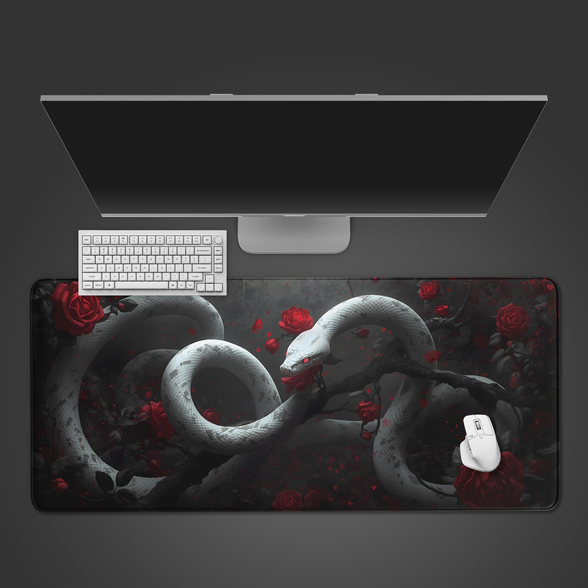 Dark Romance gothic desk mat with a white serpent and red roses. Top-down view on a desk with a black keyboard and gaming mouse. - Epic Design Pads & Mousepads
