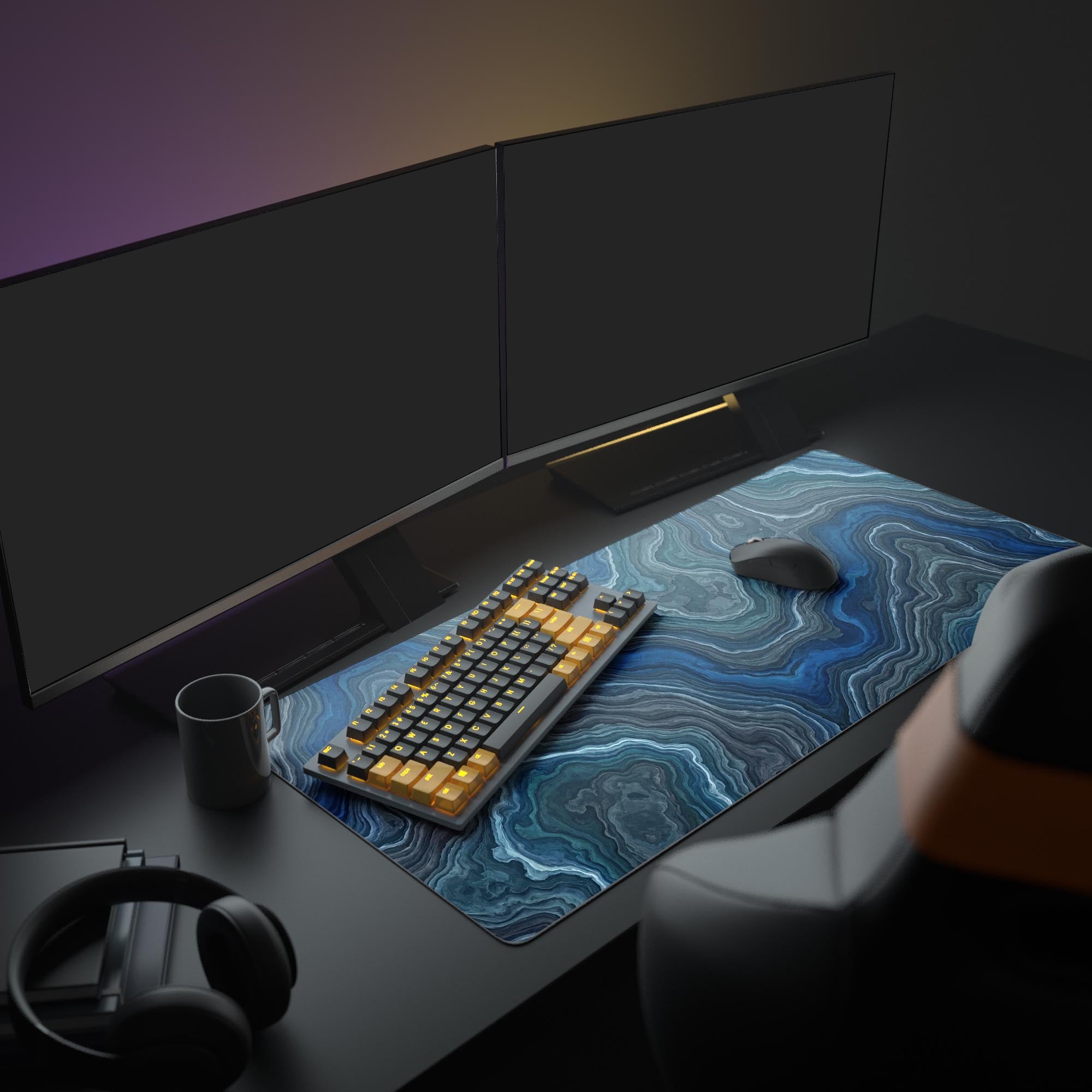 A modern computer setup featuring the Deep Strata XL mouse pad, its blue marble design unifying a minimalist desk with a monitor, keyboard, and mouse. - Epic Design Pads & Mousepads