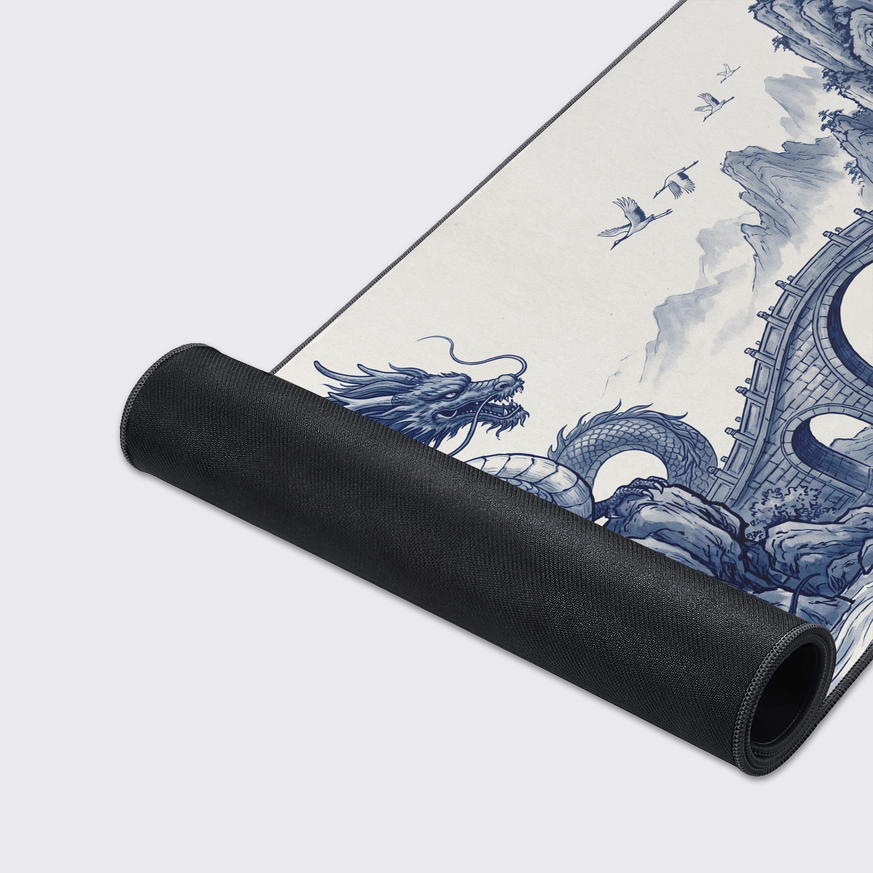 Top-down view of the blue porcelain dragon gaming mouse pad, highlighting the expansive tracking surface for keyboard and mouse.