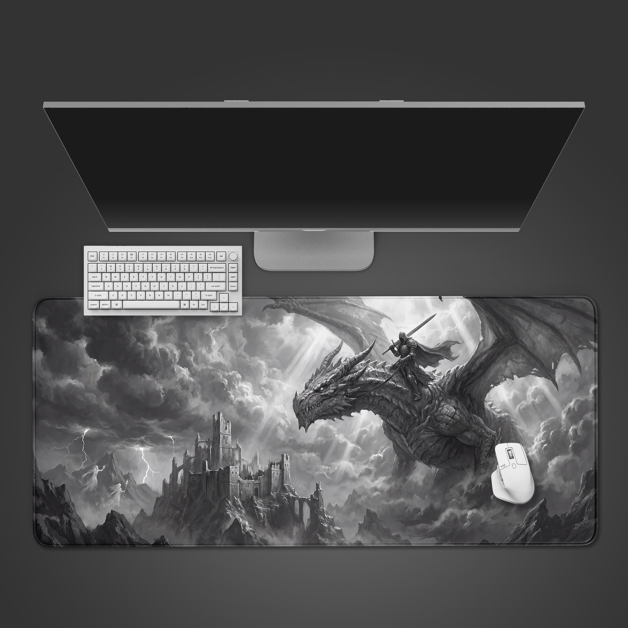 Epic monochrome dark fantasy desk mat featuring a knight riding a dragon over a gothic castle