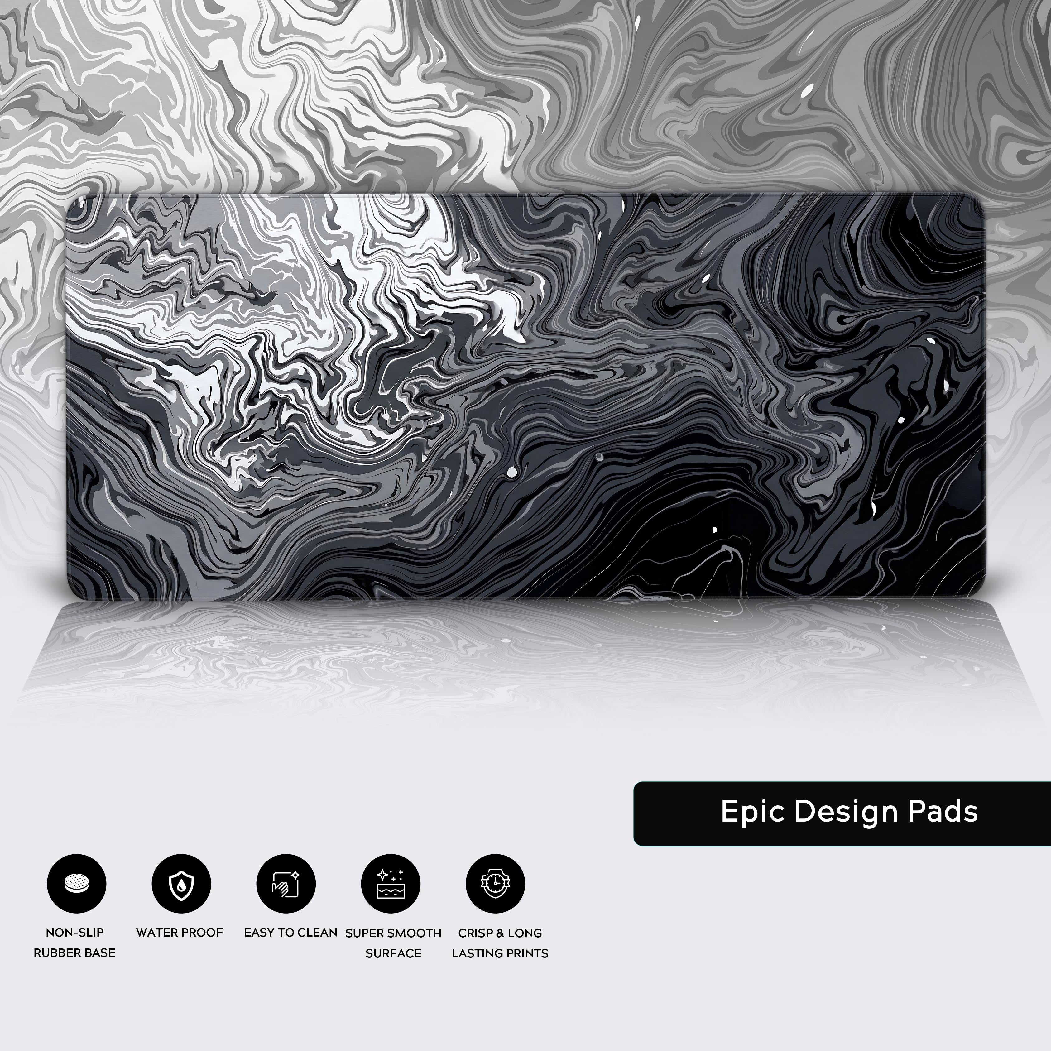 Modern workspace setup featuring the fluid black and white abstract art desk mat.
