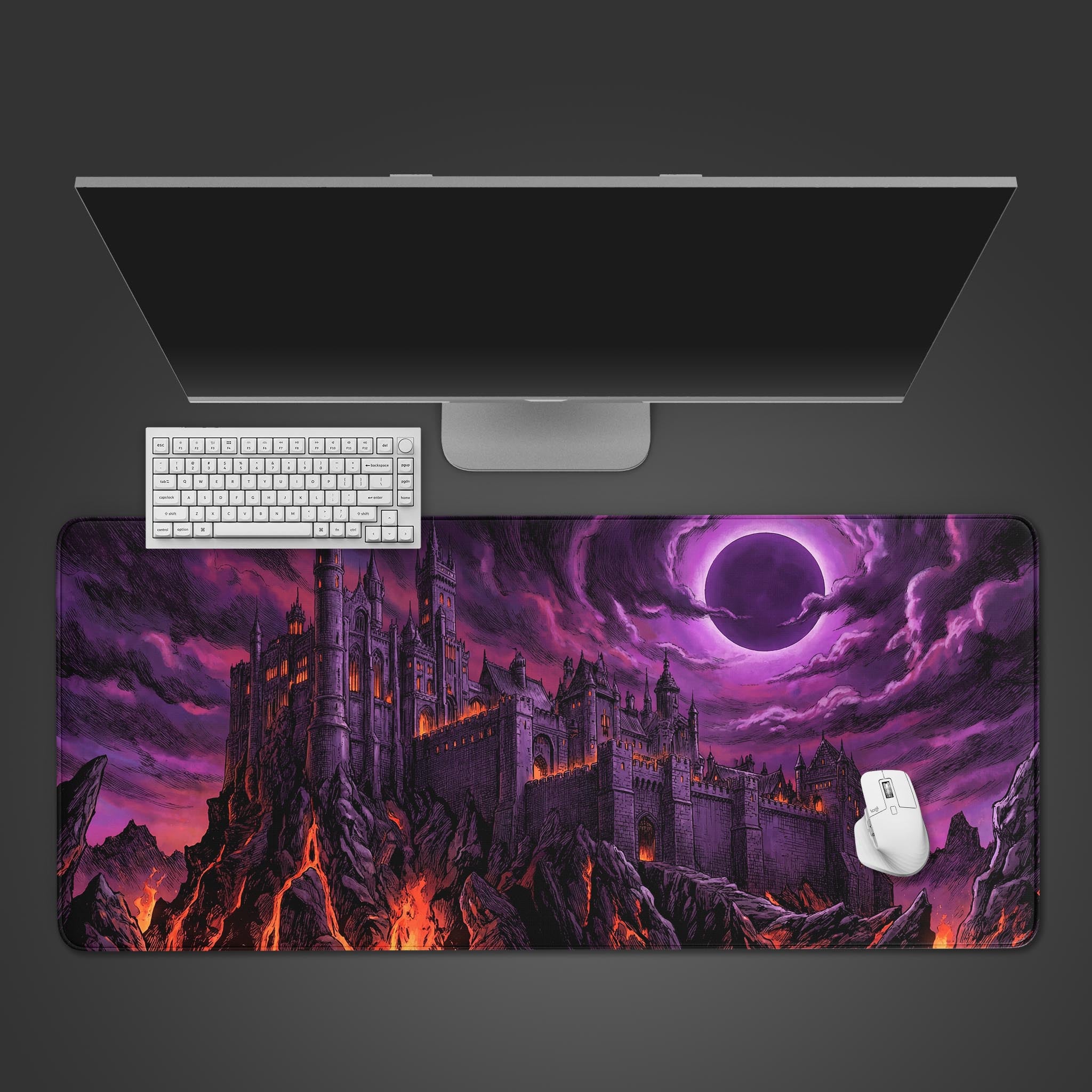 A top-down view of the Eclipse Citadel gaming desk mat, showcasing its dark castle design under a purple eclipse, with a white keyboard and mouse positioned on it. - Epic Design Pads & Mousepads