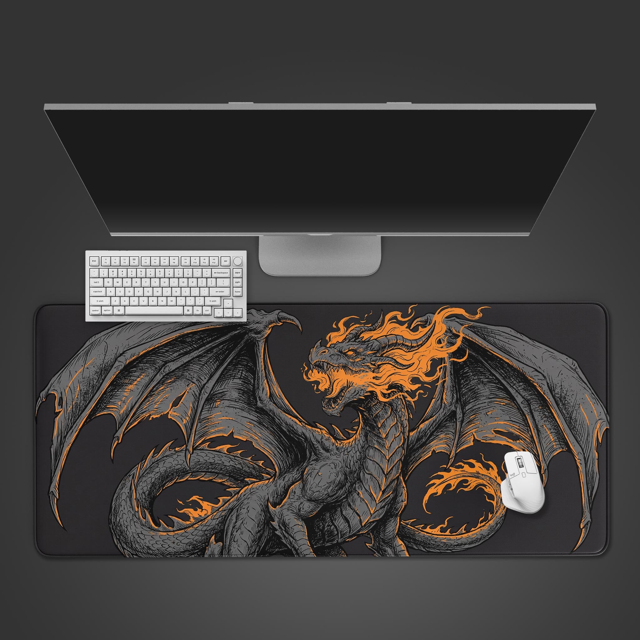 The Ember Beast dragon design on a large gaming desk mat, shown from a top-down view with a white keyboard and mouse. - Epic Design Pads & Mousepads