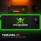 L RGB Custom Desk Pad - example: edge lit green, with a gaming team's pirate logo in the middle