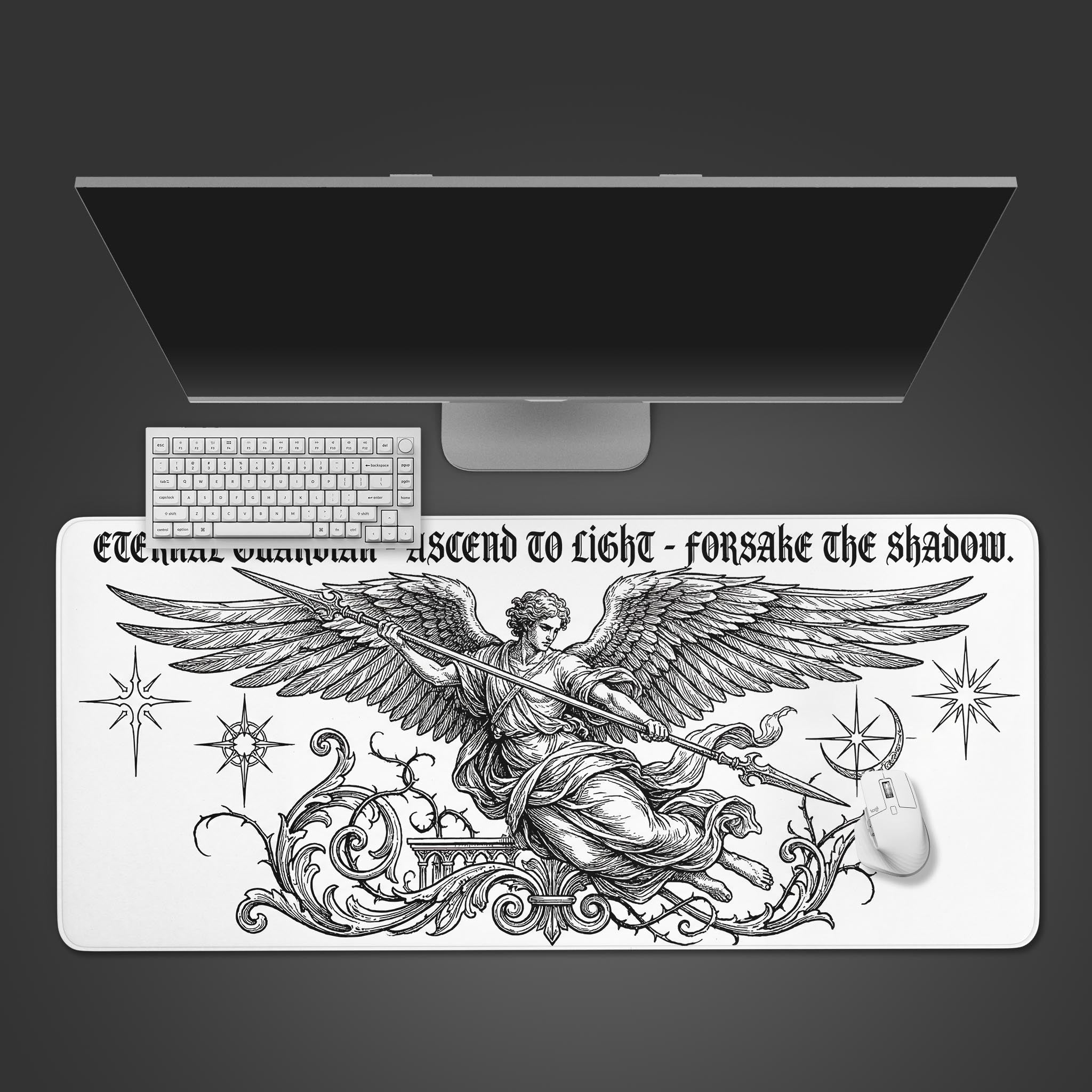 Top-down view of the Eternal Guardian gaming desk mat, featuring a detailed angel illustration, placed under a modern monitor, keyboard, and mouse. - Epic Design Pads & Mousepads