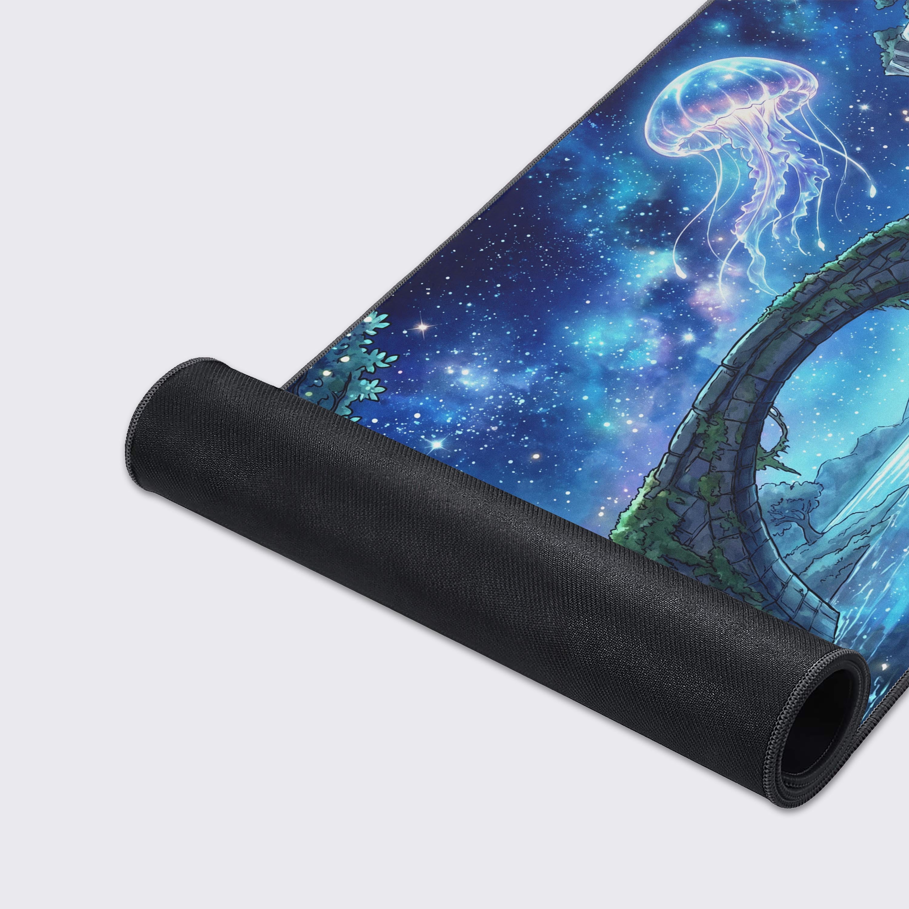 Close-up of ethereal space jellyfish and nebula art on a high-quality gaming desk mat surface