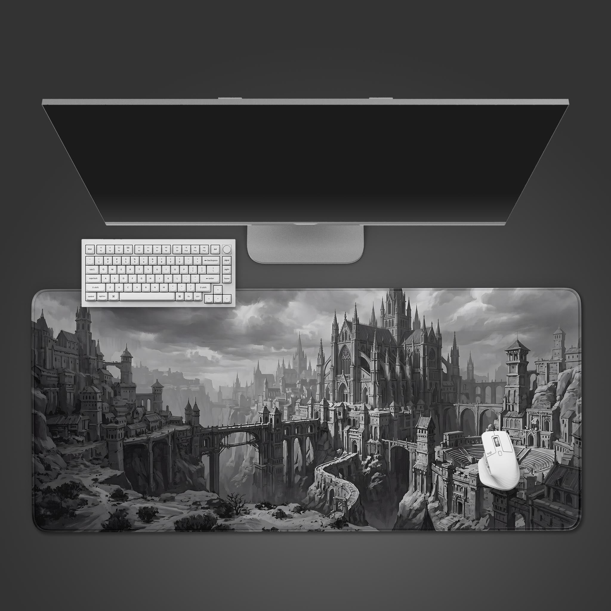 A large monochrome desk mat featuring an expansive gothic fantasy city with castles and bridges