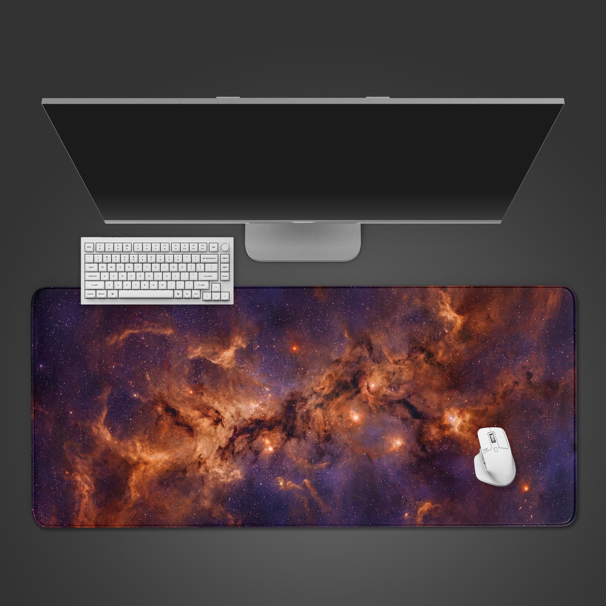 Fiery Nebula space desk mat showing vibrant orange and purple cosmic dust clouds