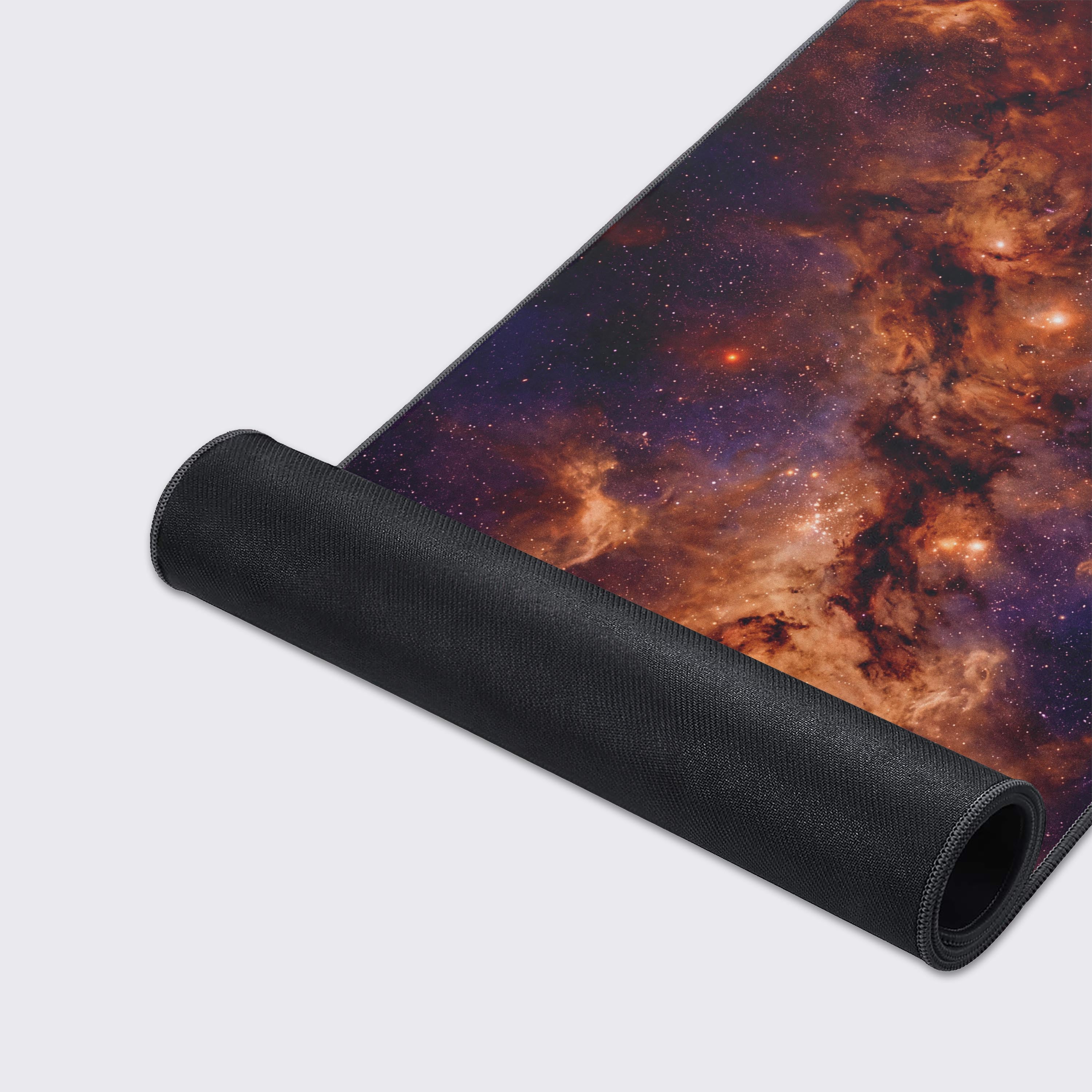 Features graphic highlighting the water-proof, easy to clean, and non-slip rubber base of the galaxy desk mat