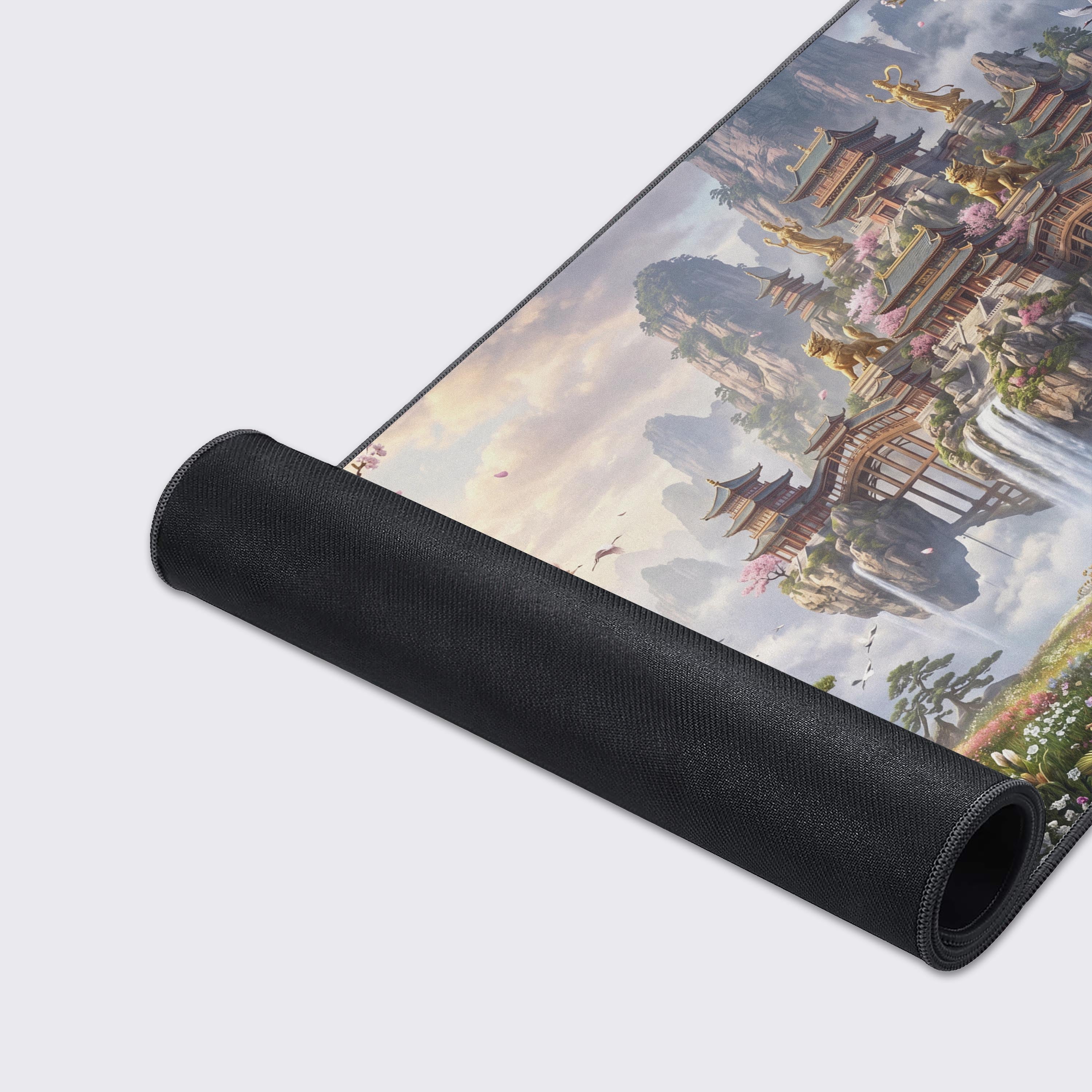 Wide view of the extended gaming mouse pad displaying a serene river, misty mountains, and a celestial temple complex.